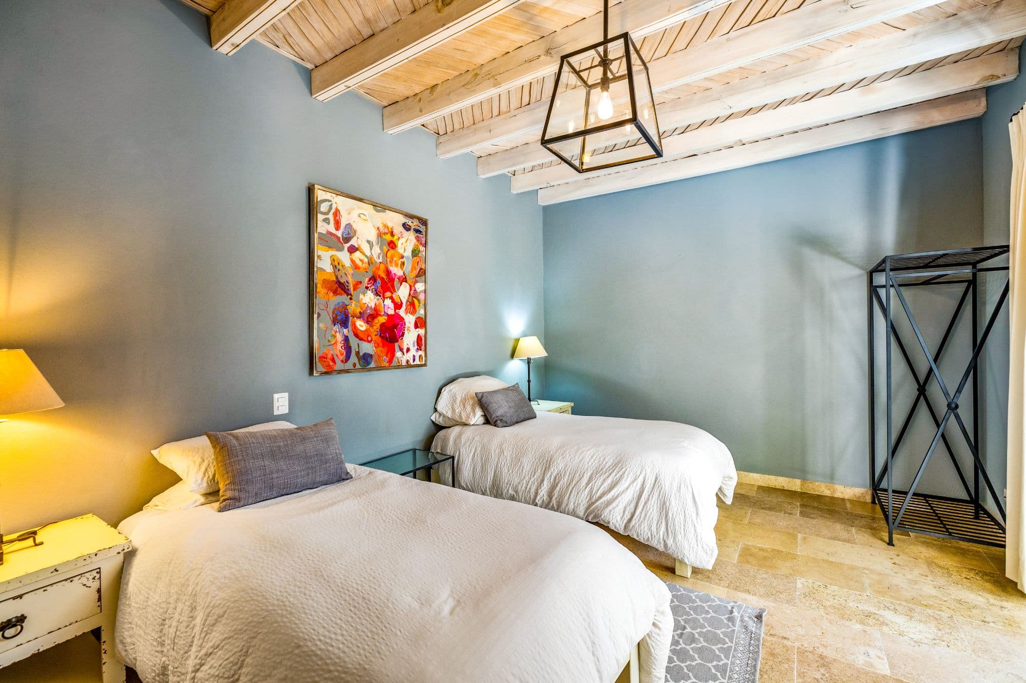 CASA PINO — Guadalupe, San Miguel de Allende — photo 10 — serene dual bedroom with rustic beams