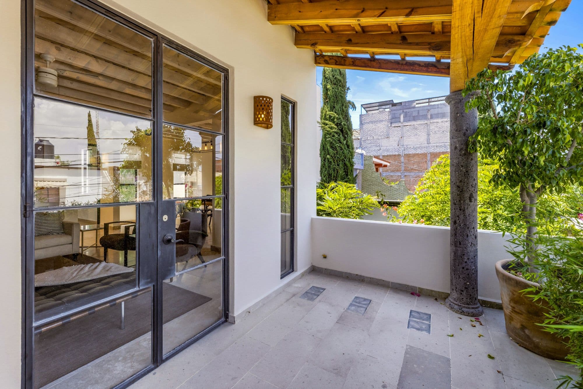CASA PINO — Guadalupe, San Miguel de Allende — photo 18 — serene terrace with mature garden views