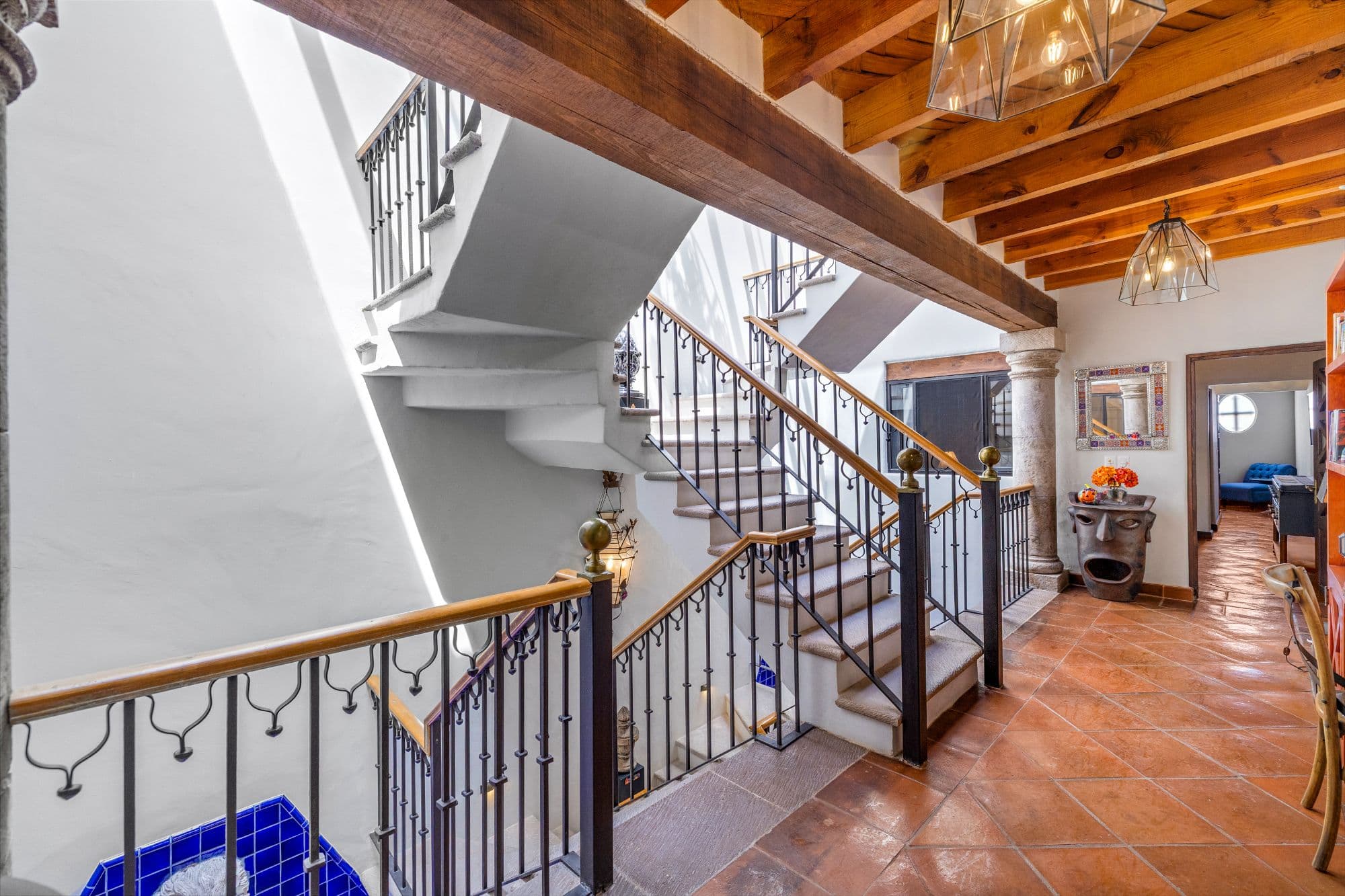 Casa Cocuchas — San Miguel de Allende Centro, San Miguel de Allende — photo 14 — soaring wooden beams, luminous stairwell