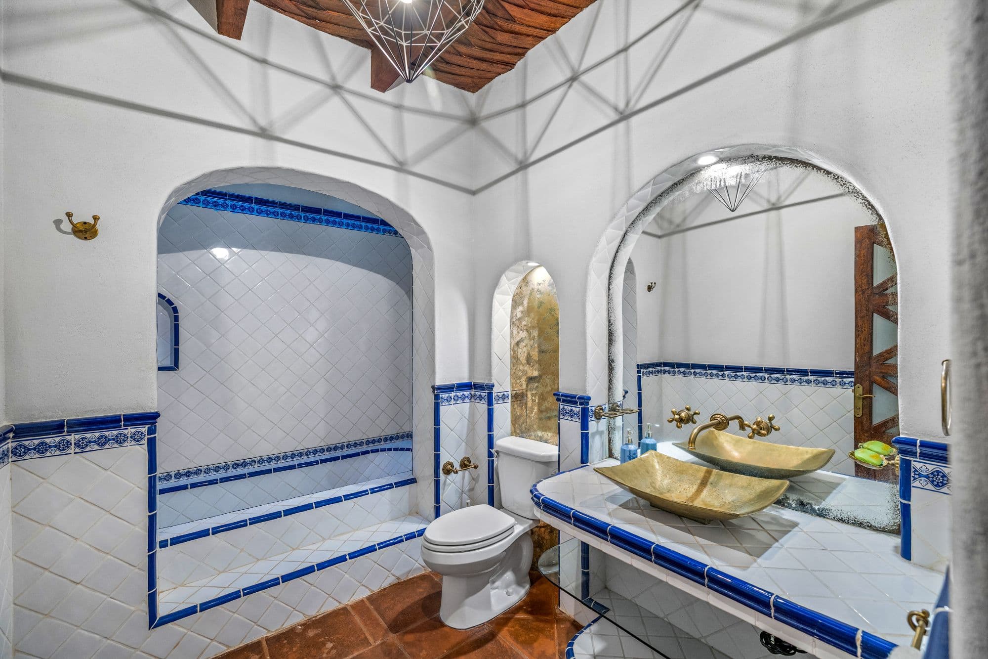 Casa Cocuchas — San Miguel de Allende Centro, San Miguel de Allende — photo 17 — authentic colonial bathroom with artisanal tilework