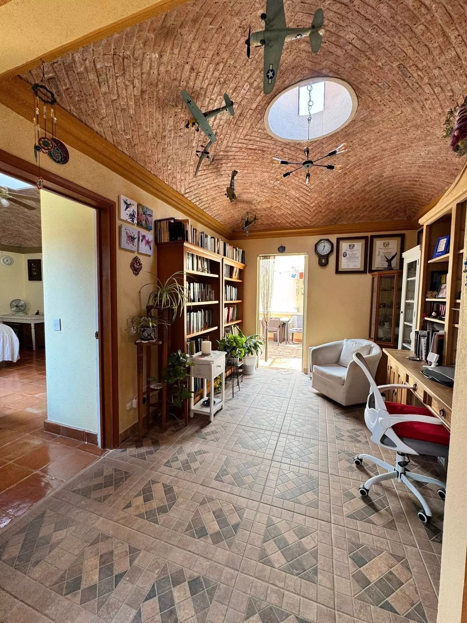 Casa Fuente del Moro — Atascadero (Arcos de San Miguel), San Miguel de Allende — photo 23 — sophisticated study with soaring brick vaulted ceilings