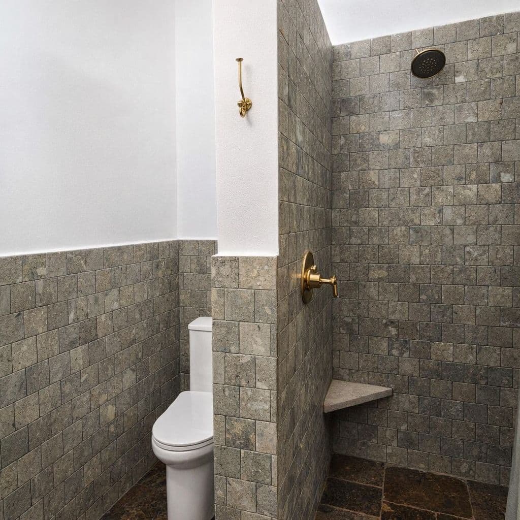 Breathtaking Casa Blanca — Guadiana, San Miguel de Allende — photo 33 — spa-inspired shower with travertine elegance