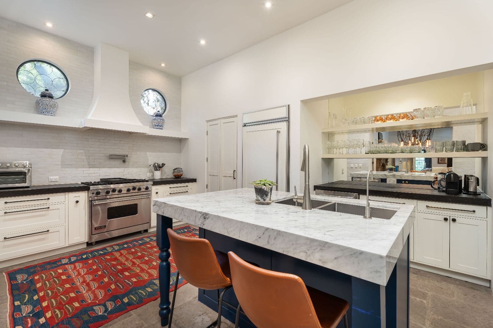 Casa Santa Mónica — Centro, San Miguel de Allende — photo 6 — sophisticated chef's kitchen, marble elegance