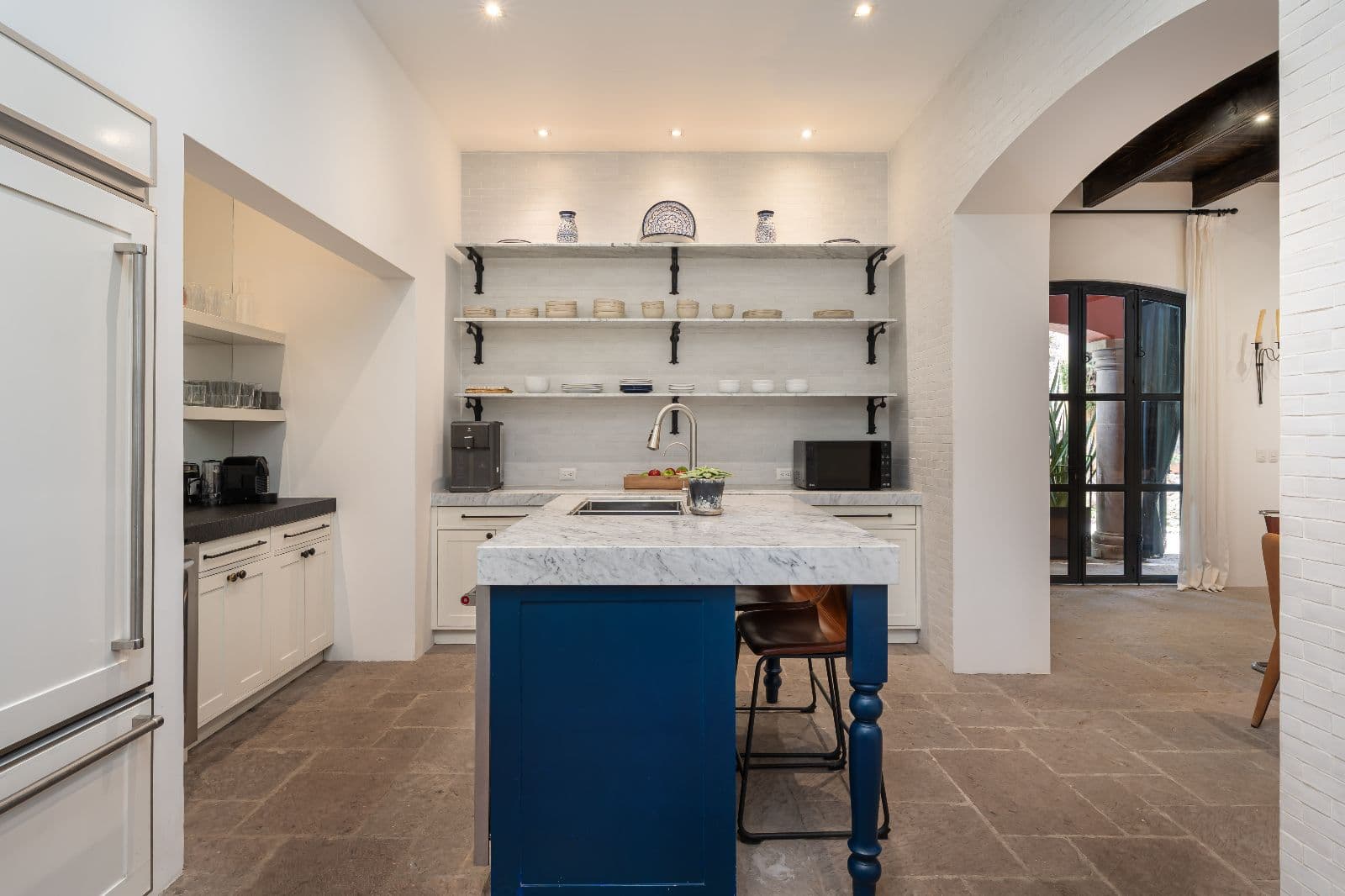 Casa Santa Mónica — Centro, San Miguel de Allende — photo 7 — sophisticated chef's kitchen, marble elegance