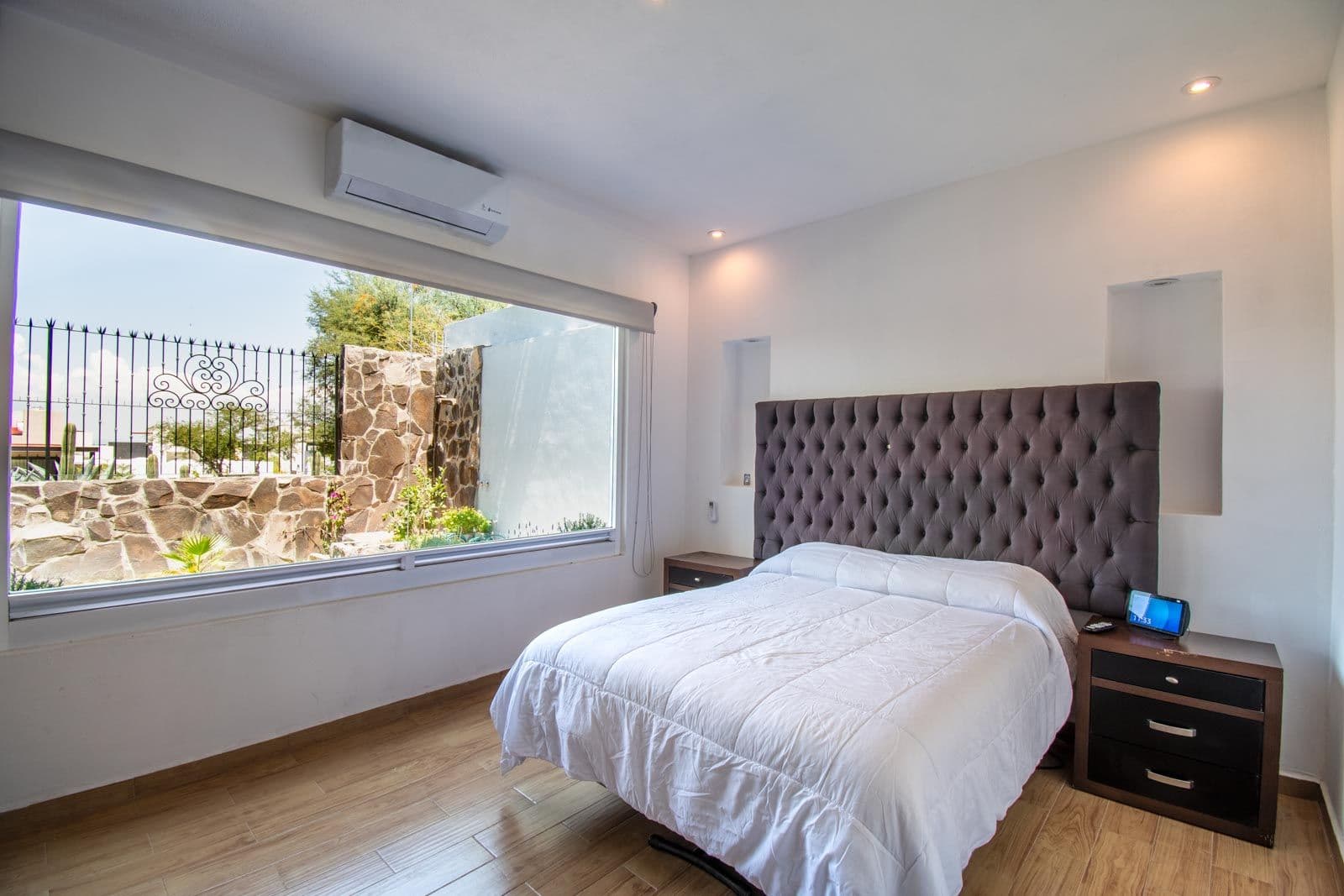 Casa Verona — El Capricho, San Miguel de Allende — photo 22 — serene master suite, panoramic garden views
