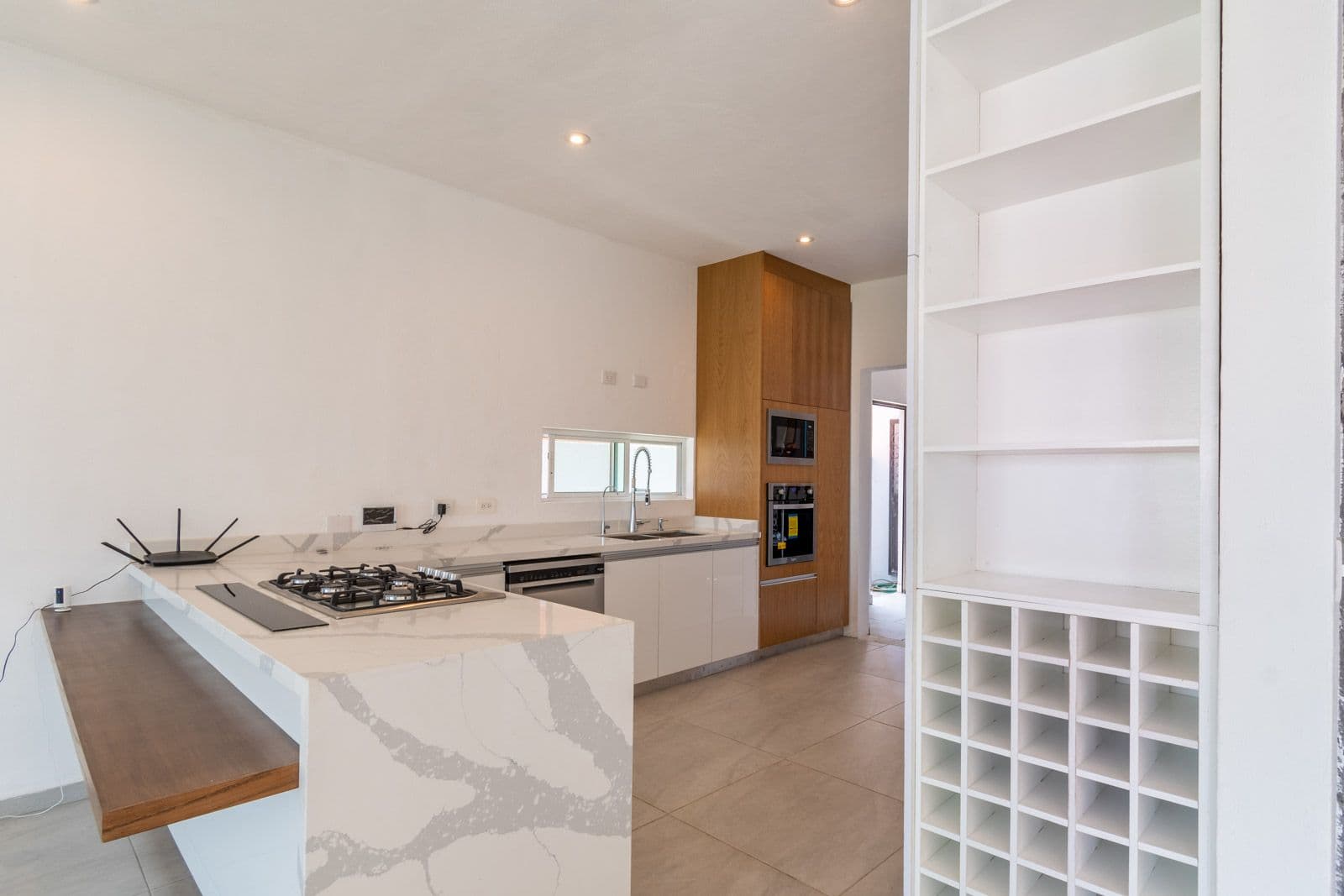 Casa Verona — El Capricho, San Miguel de Allende — photo 8 — contemporary luxury kitchen with abundant light