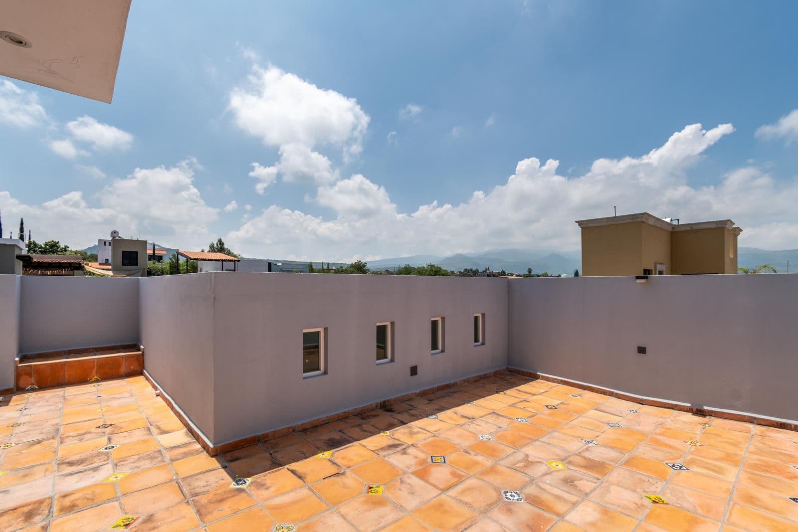 Casa Verona — El Capricho, San Miguel de Allende — photo 19 — expansive rooftop terrace with mountain views