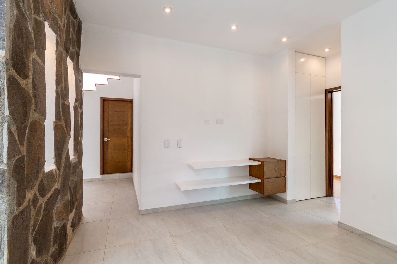 Casa Verona — El Capricho, San Miguel de Allende — photo 11 — modern split-level living space, architectural charm