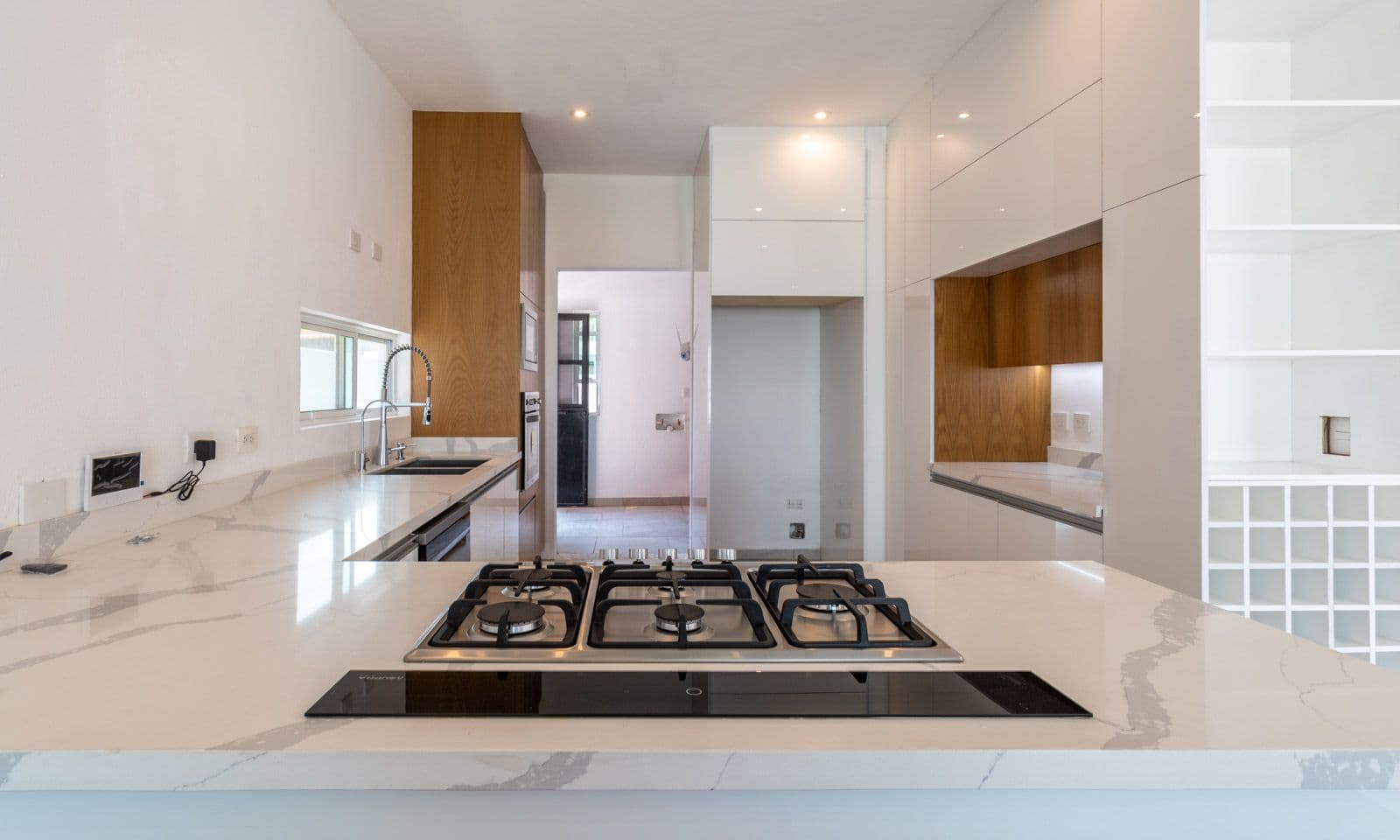 Casa Verona — El Capricho, San Miguel de Allende — photo 9 — contemporary chef's kitchen, luminous elegance