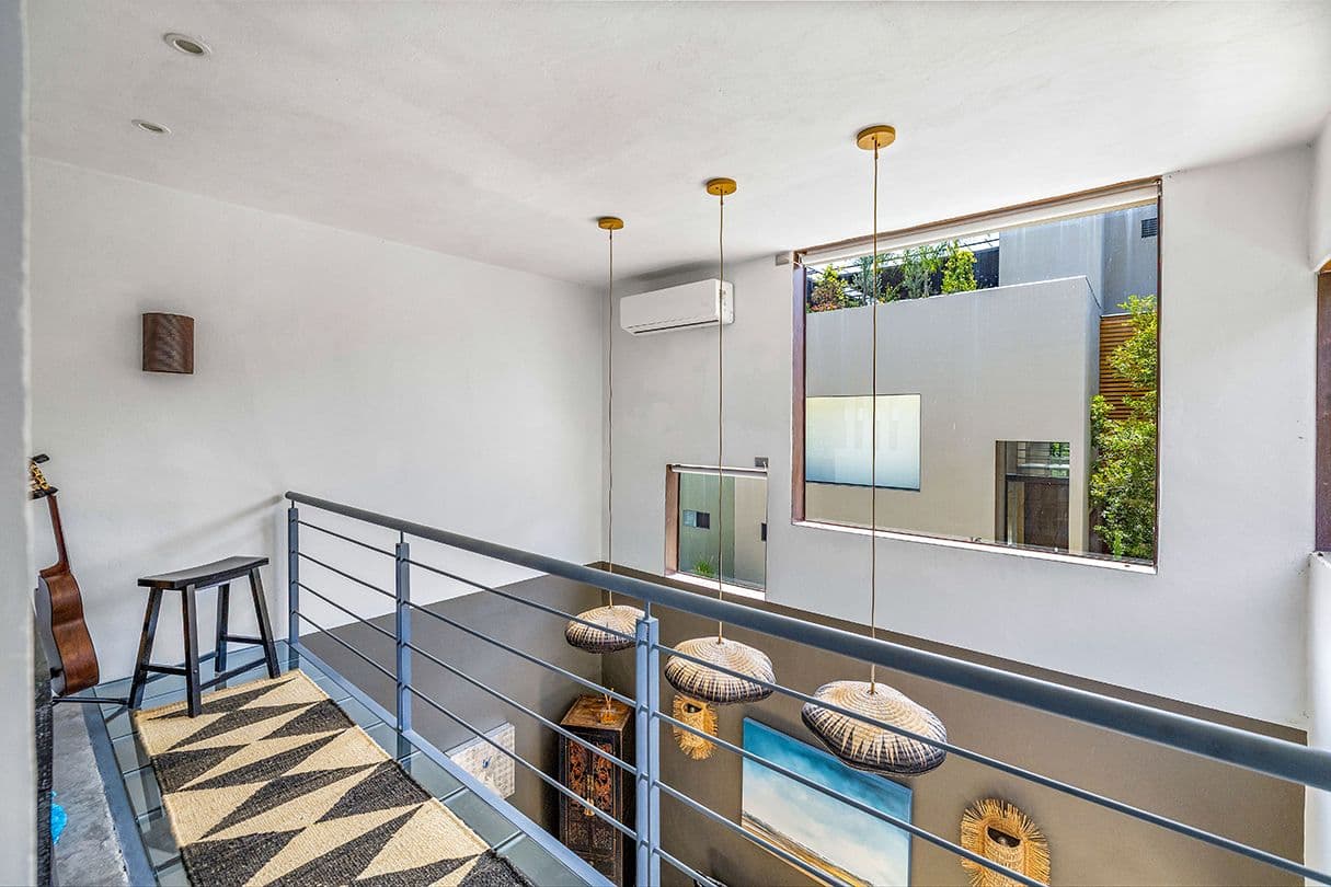 Casa 19 — Centro, San Miguel de Allende — photo 13 — sophisticated mezzanine with curated artisan accents