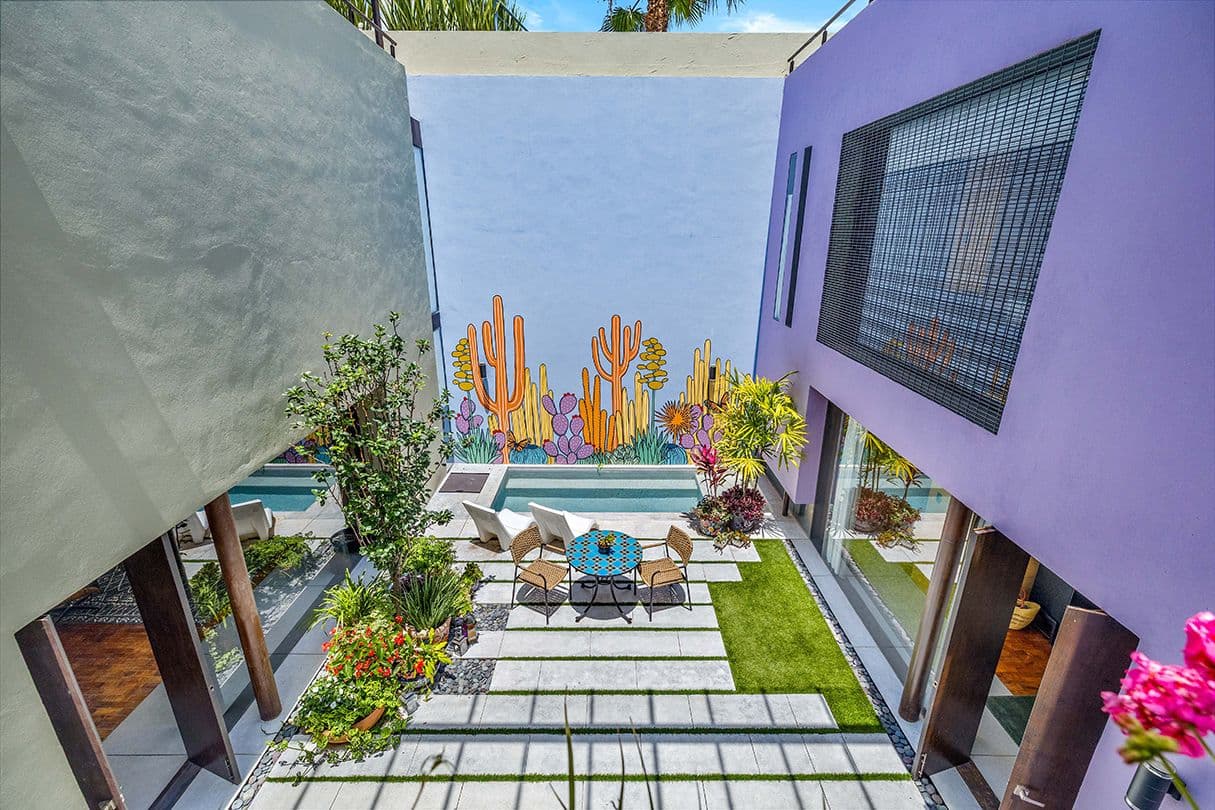 Casa 19 — Centro, San Miguel de Allende — photo 16 — vibrant courtyard with serene pool oasis