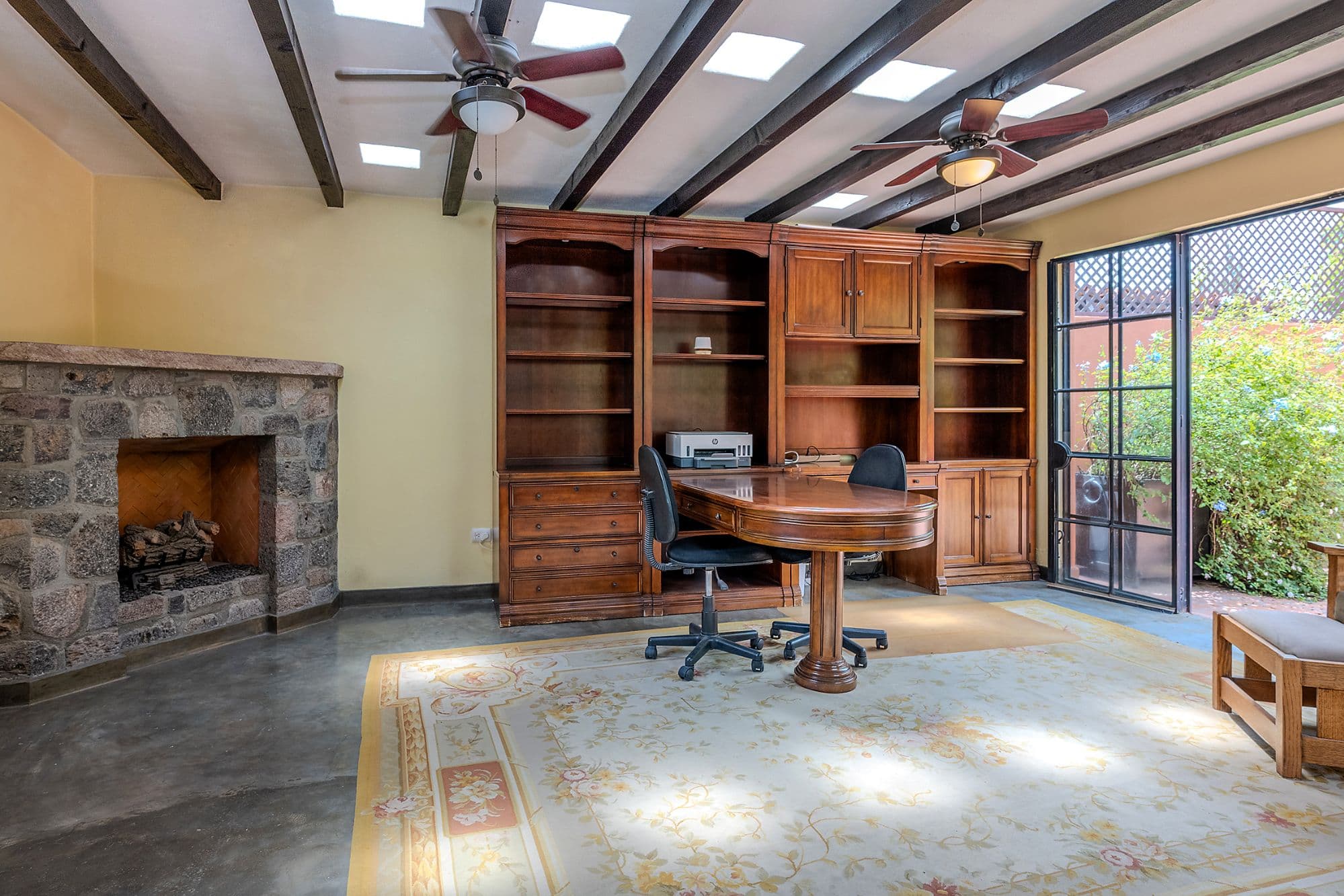 Casa Del Encanto — Guadiana, San Miguel de Allende — photo 19 — sophisticated home office with fireplace charm