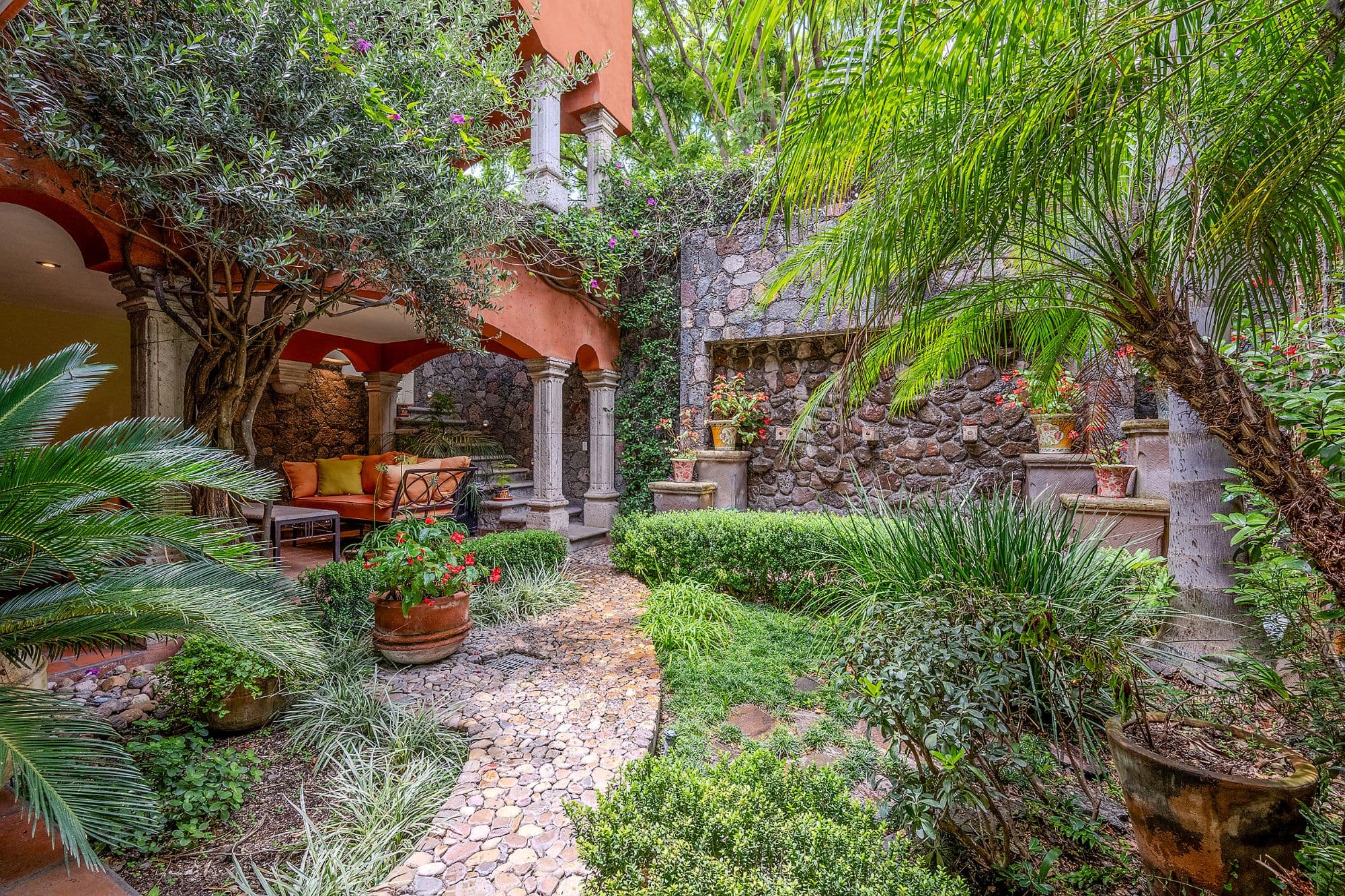 Casa Del Encanto — Guadiana, San Miguel de Allende — photo 20 — verdant courtyard oasis, colonial elegance