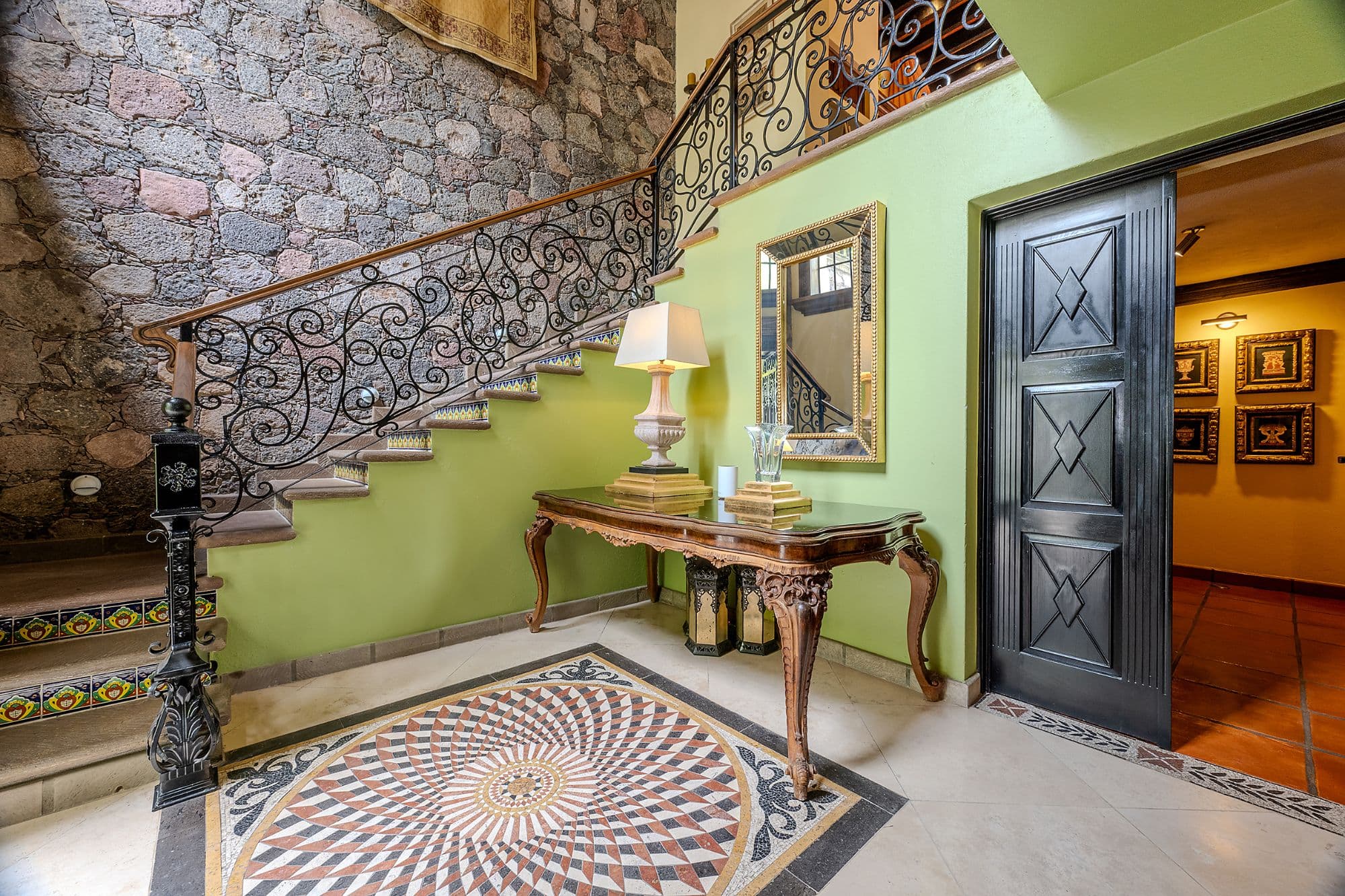 Casa Del Encanto — Guadiana, San Miguel de Allende — photo 5 — elegant entry foyer with ornate ironwork