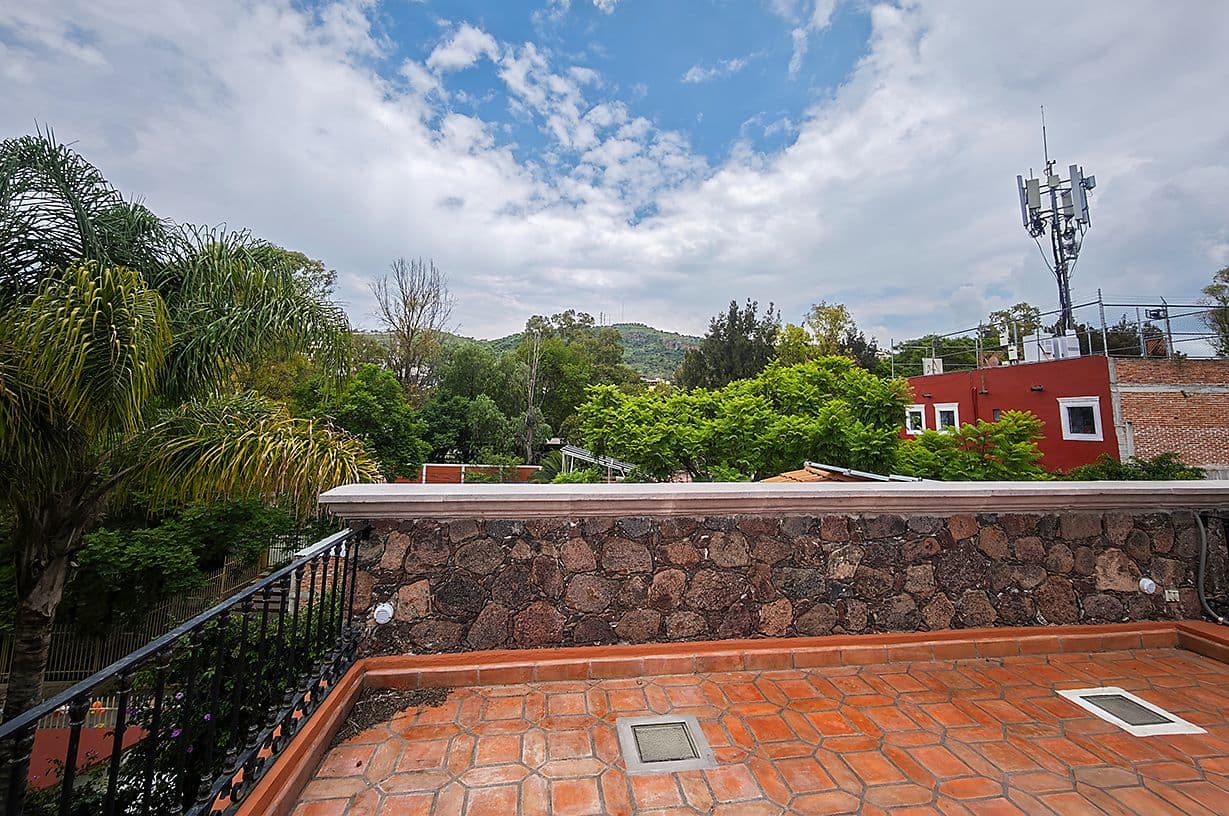 Casa Del Encanto — Guadiana, San Miguel de Allende — photo 29 — expansive rooftop terrace with panoramic views