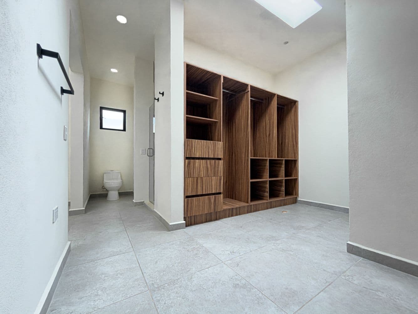 Casa Maple — Centro, San Miguel de Allende — photo 19 — luxurious walk-in closet with curated storage