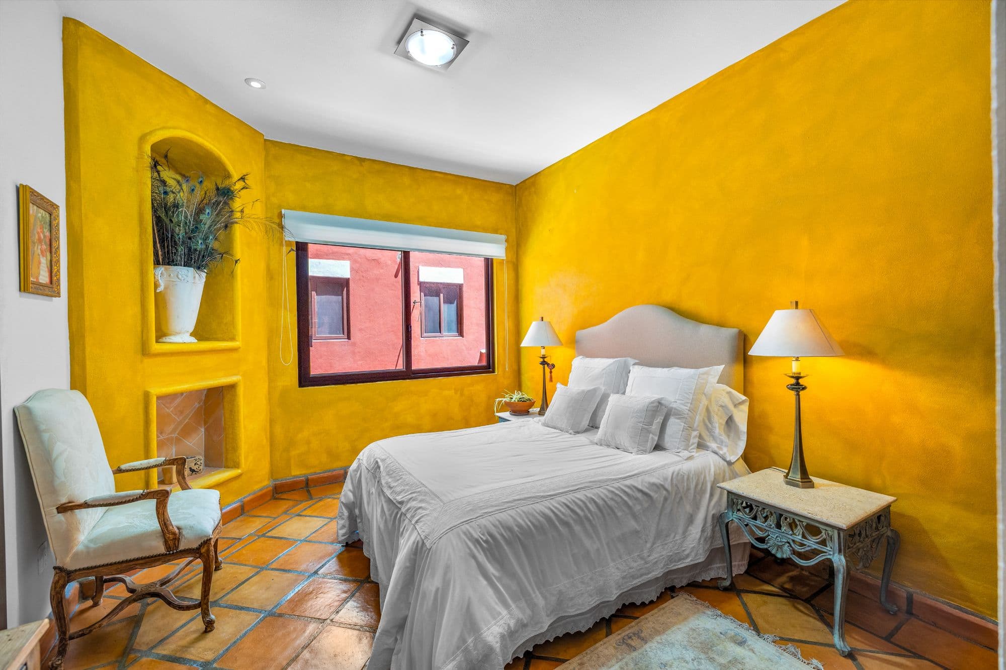 Condo Girasoles — San Miguel de Allende Centro, San Miguel de Allende — photo 20 — vibrant sun-drenched mexican bedroom
