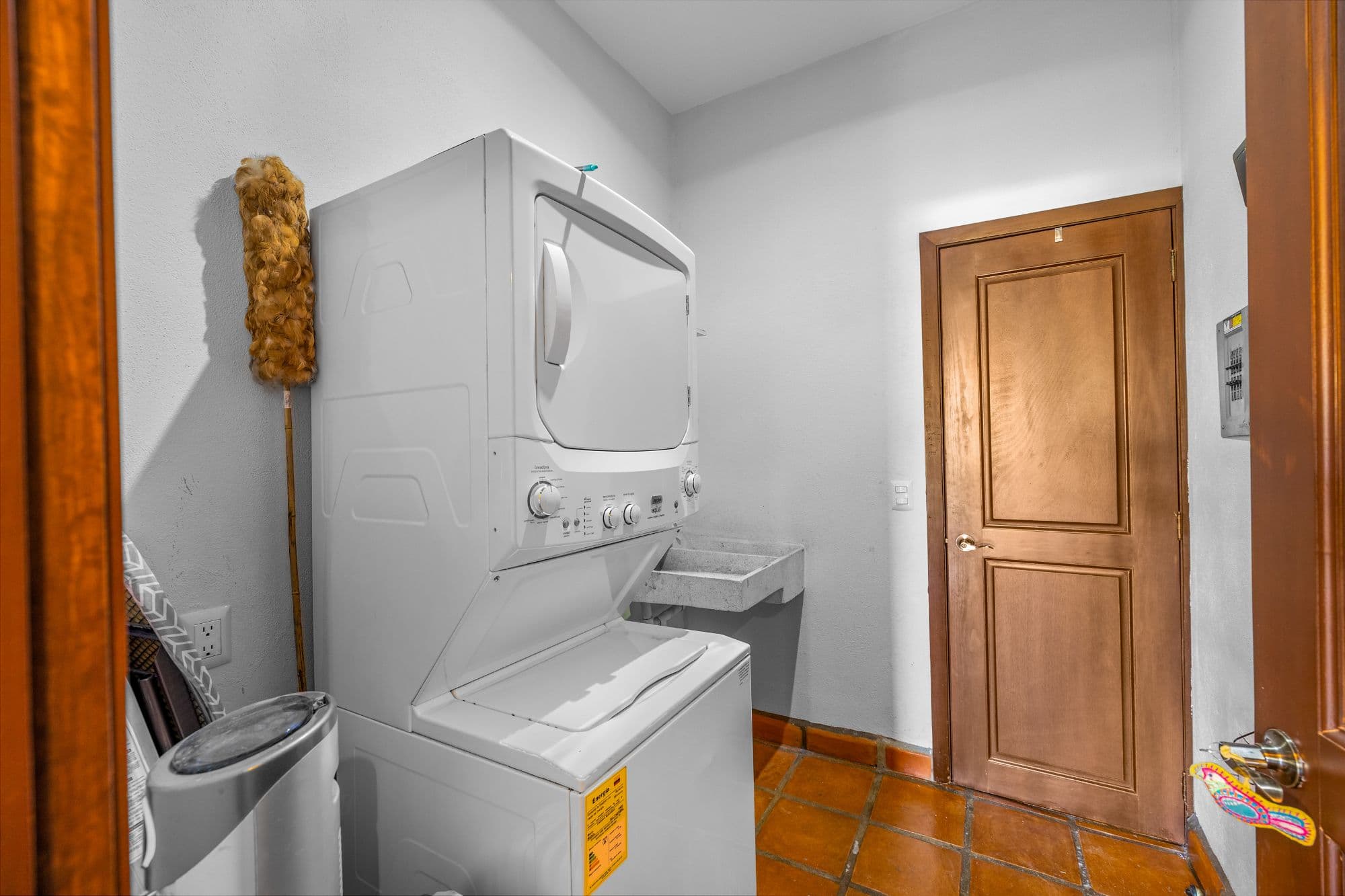 Condo Girasoles — San Miguel de Allende Centro, San Miguel de Allende — photo 18 — charming utility room, traditional mexican tile