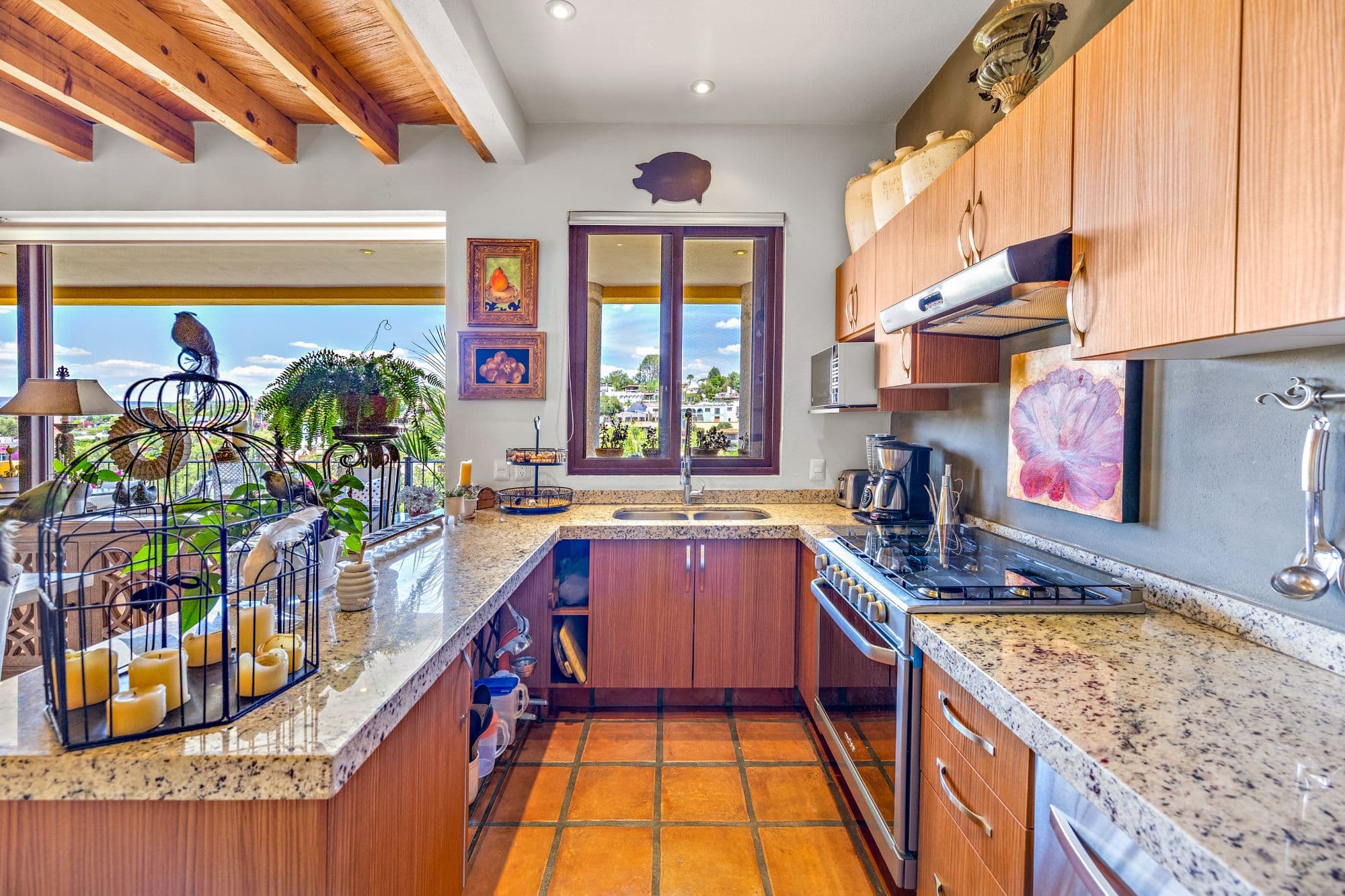 Condo Girasoles — San Miguel de Allende Centro, San Miguel de Allende — photo 4 — luminous gourmet kitchen with panoramic valley views