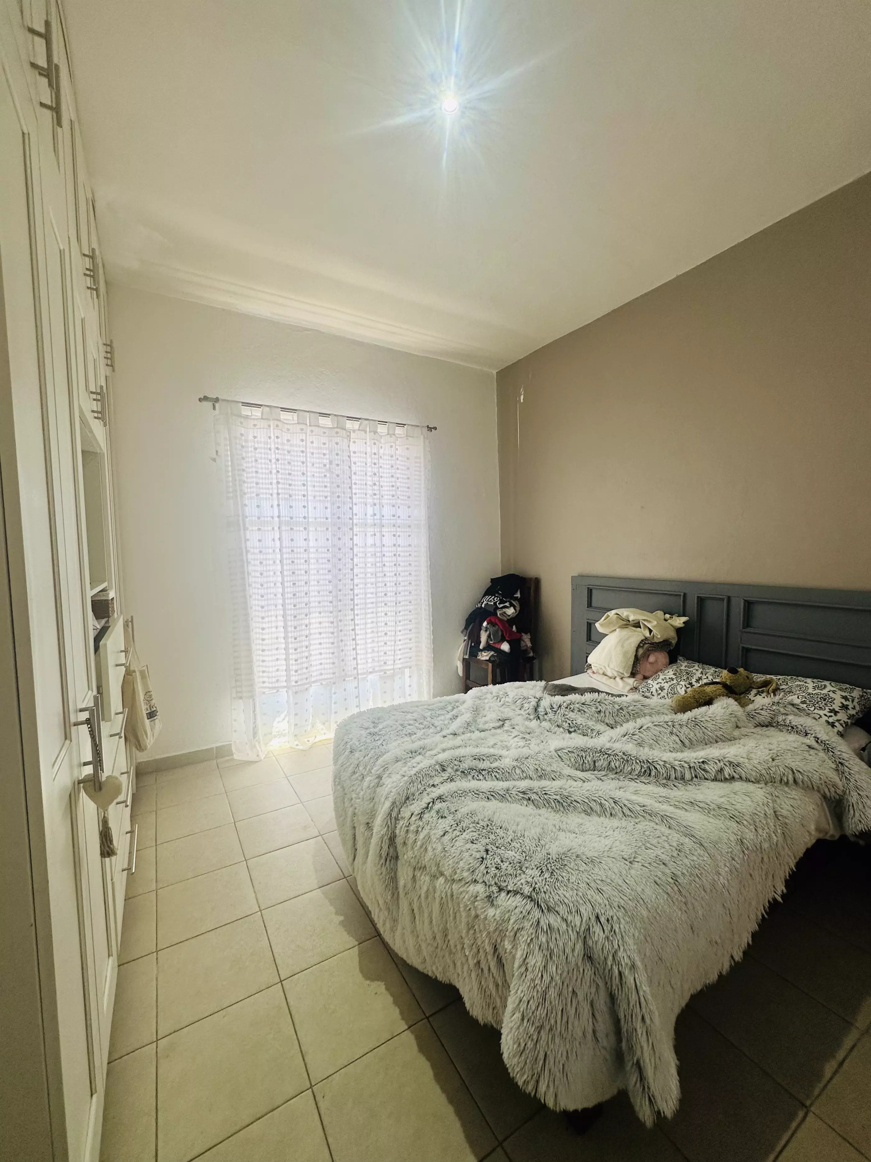Condominio Info Allende — Aurora, San Miguel de Allende — photo 14 — bright, airy bedroom with natural light