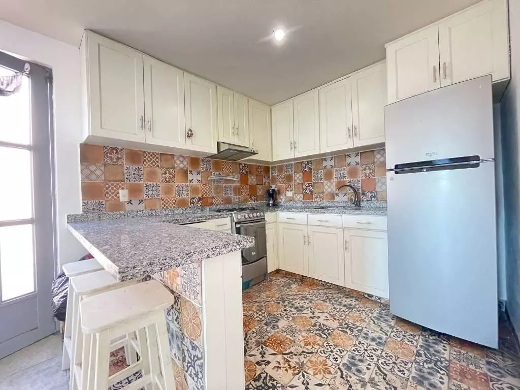 Condominio Info Allende — Aurora, San Miguel de Allende — photo 2 — charming traditional mexican kitchen