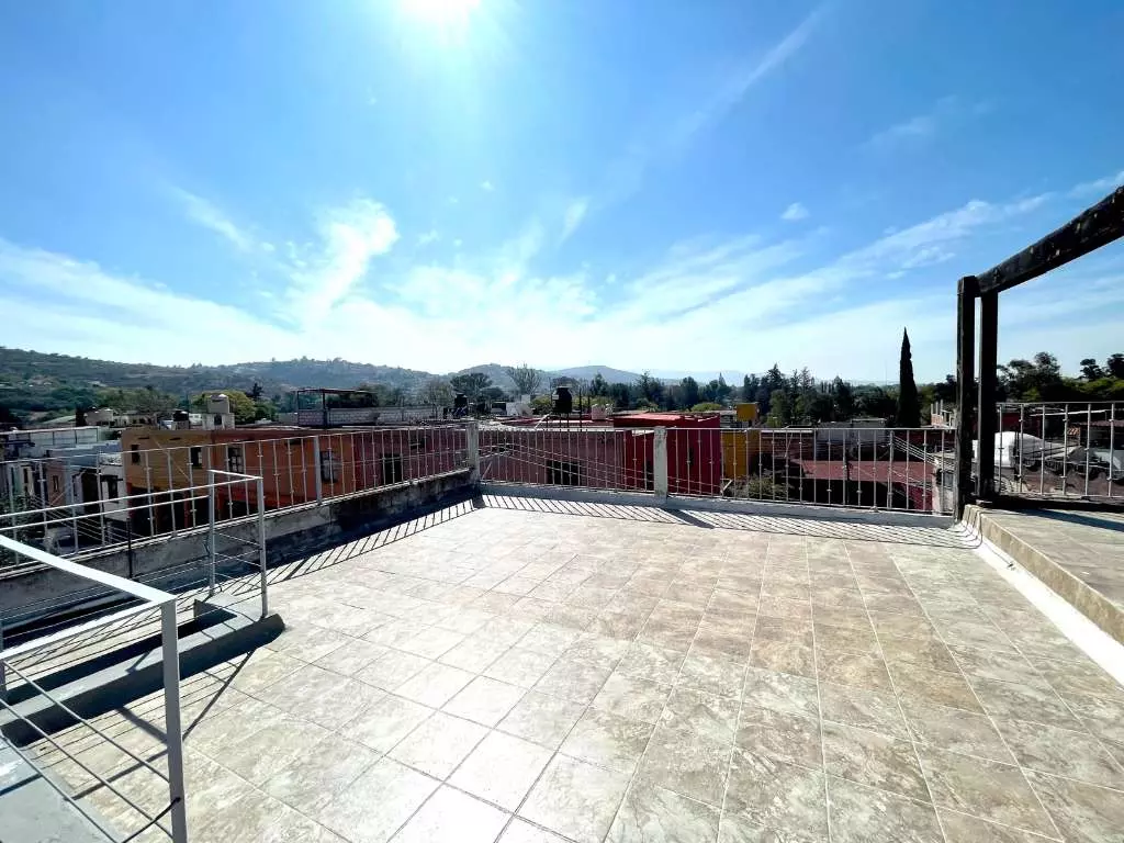 Condominio Info Allende — Aurora, San Miguel de Allende — photo 9 — expansive rooftop terrace, breathtaking mountain views