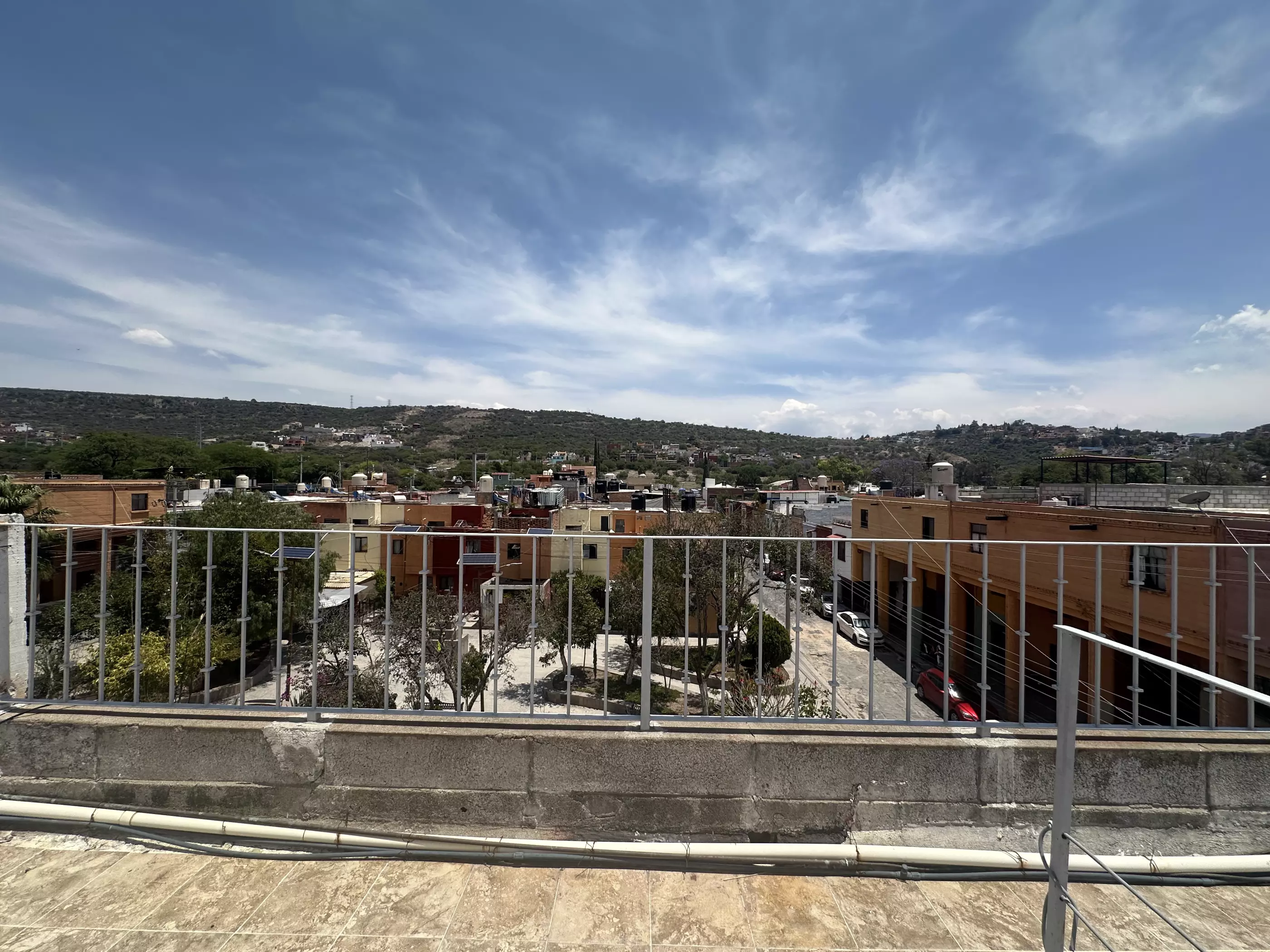 Condominio Info Allende — Aurora, San Miguel de Allende — photo 15 — panoramic hillside views, contemporary rooftop sanctuary