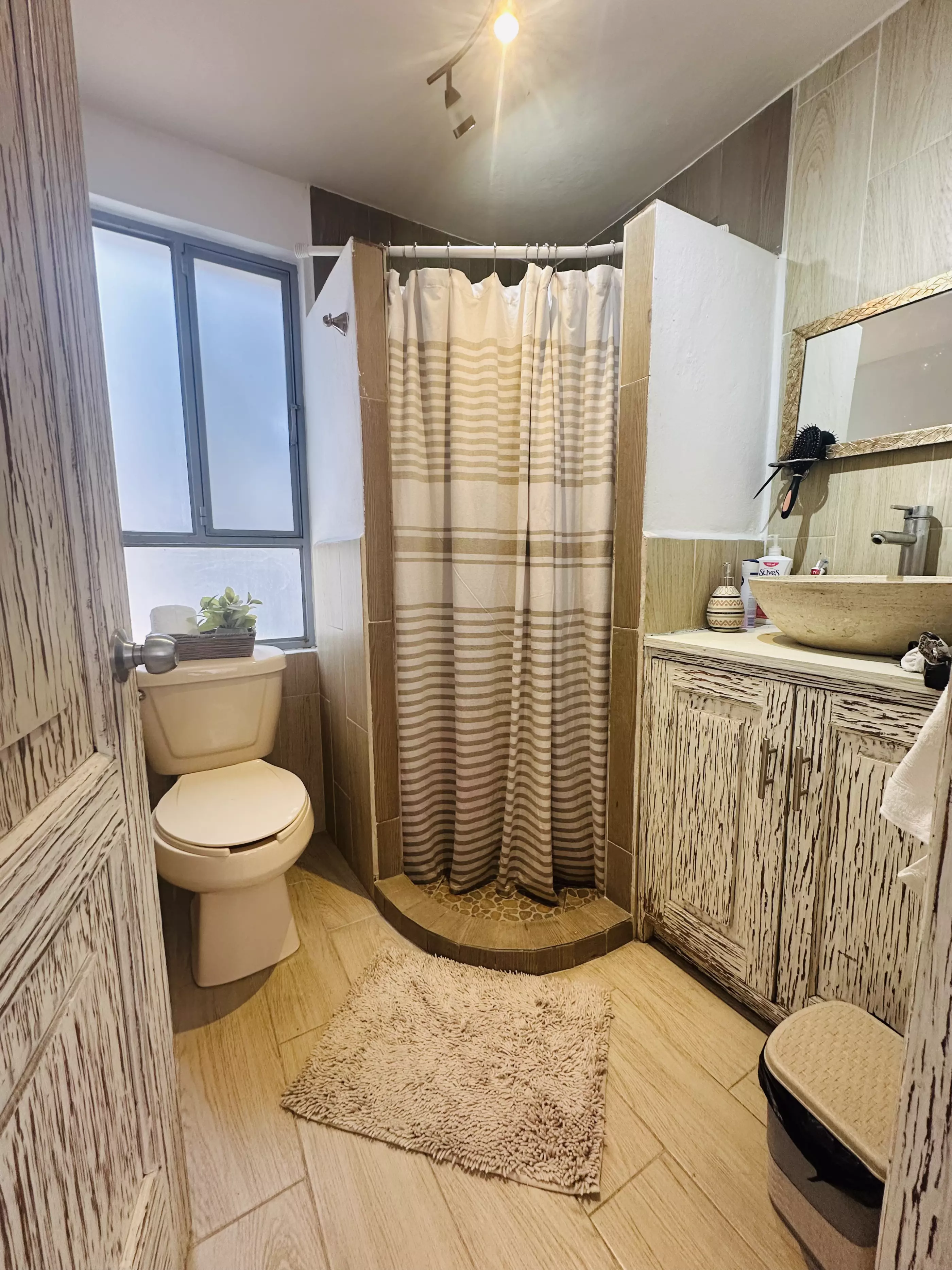 Condominio Info Allende — Aurora, San Miguel de Allende — photo 16 — serene spa-inspired master bath retreat