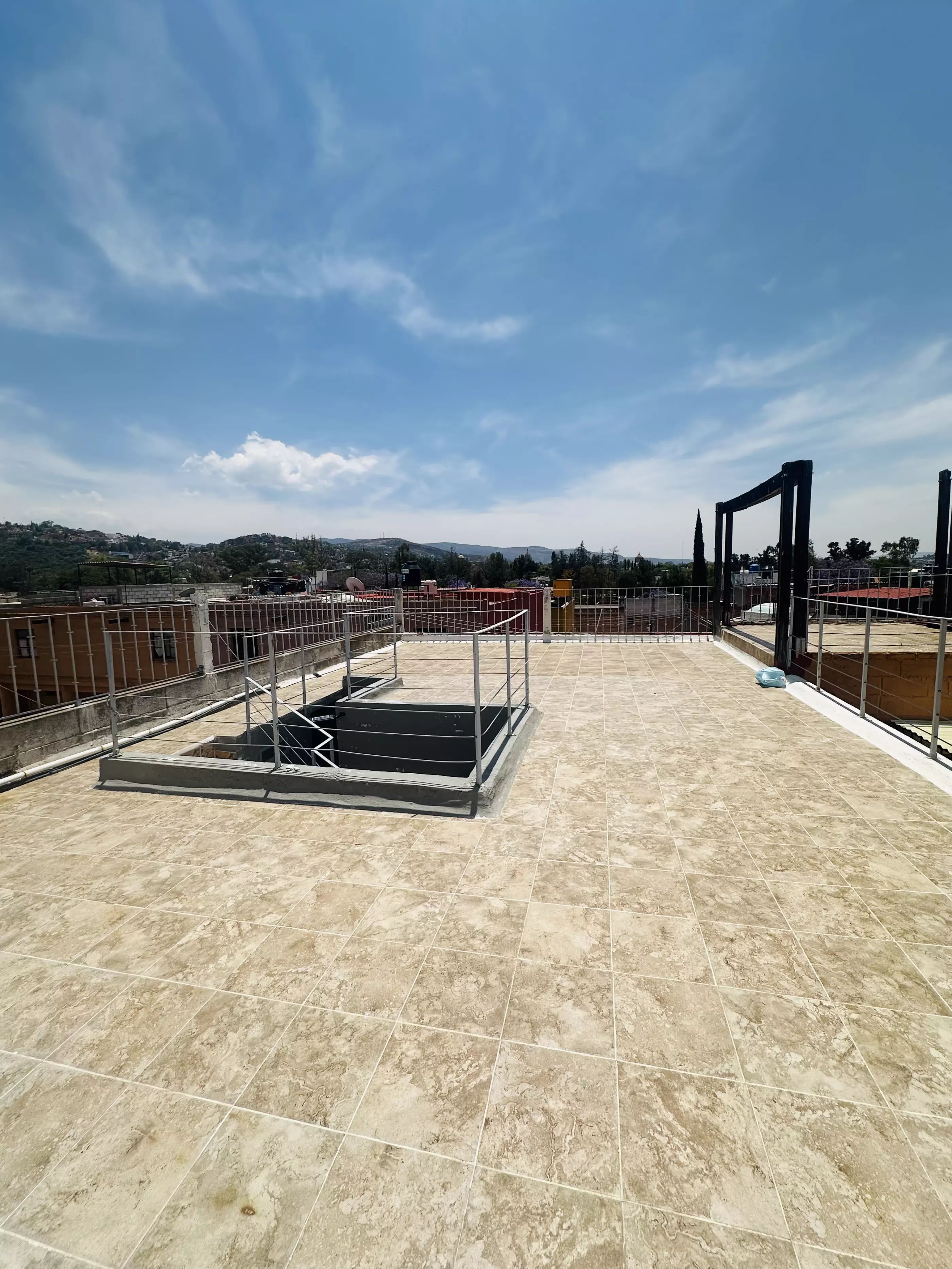 Condominio Info Allende — Aurora, San Miguel de Allende — photo 12 — expansive rooftop with mountain vistas