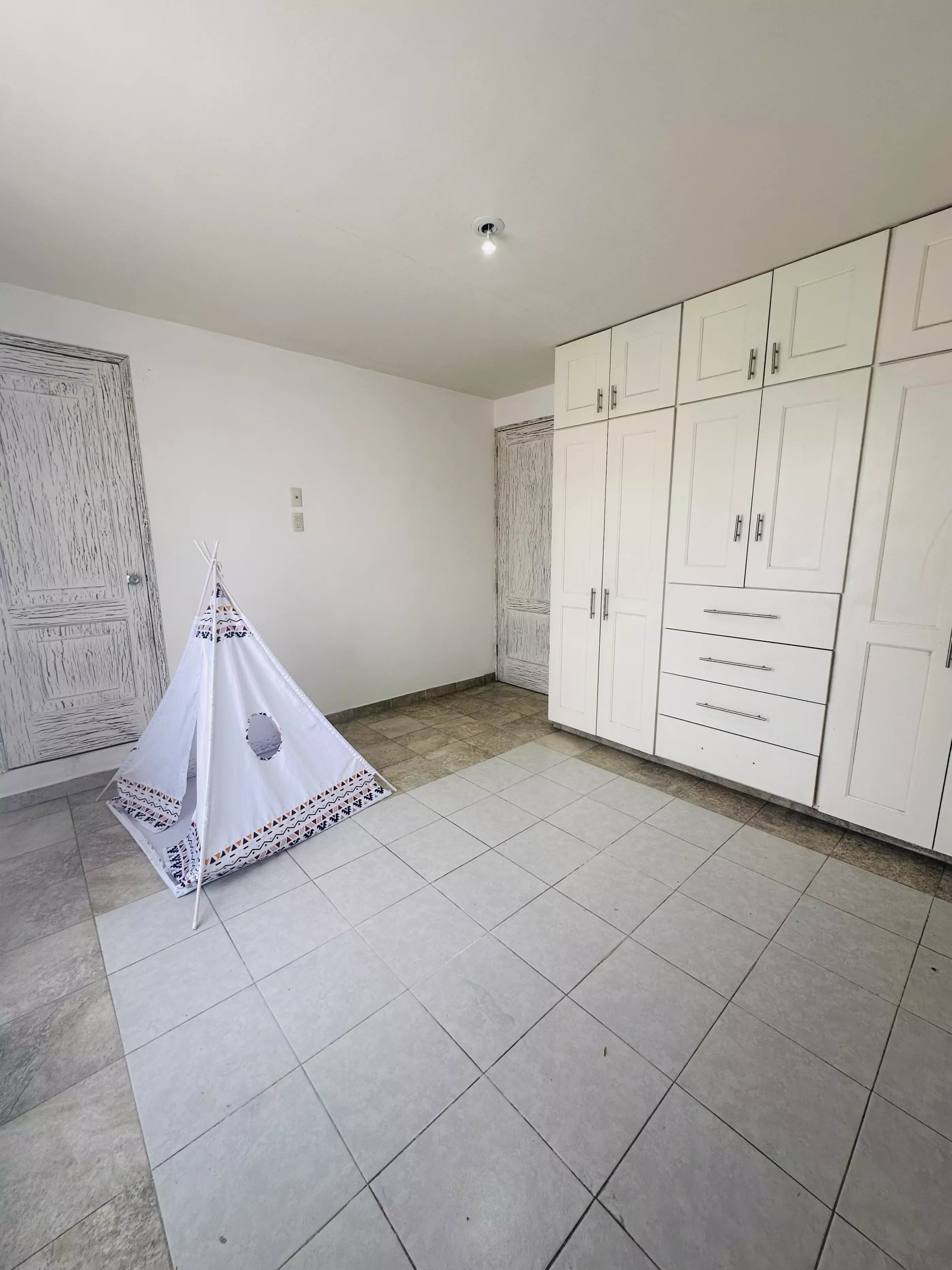 Condominio Info Allende — Aurora, San Miguel de Allende — photo 9 — spacious bedroom with generous storage