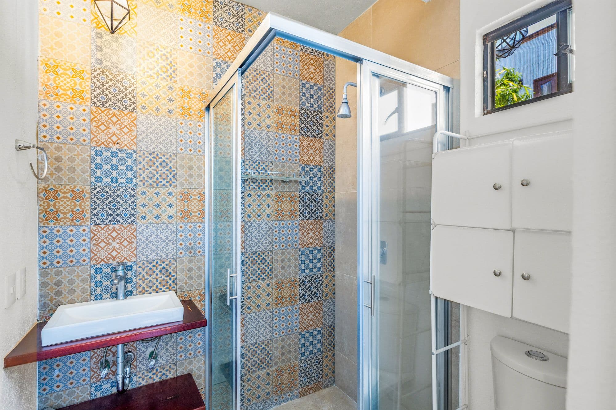 Departamentos San Rafael — San Rafael, San Miguel de Allende — photo 9 — artisan-tiled luxury spa bathroom