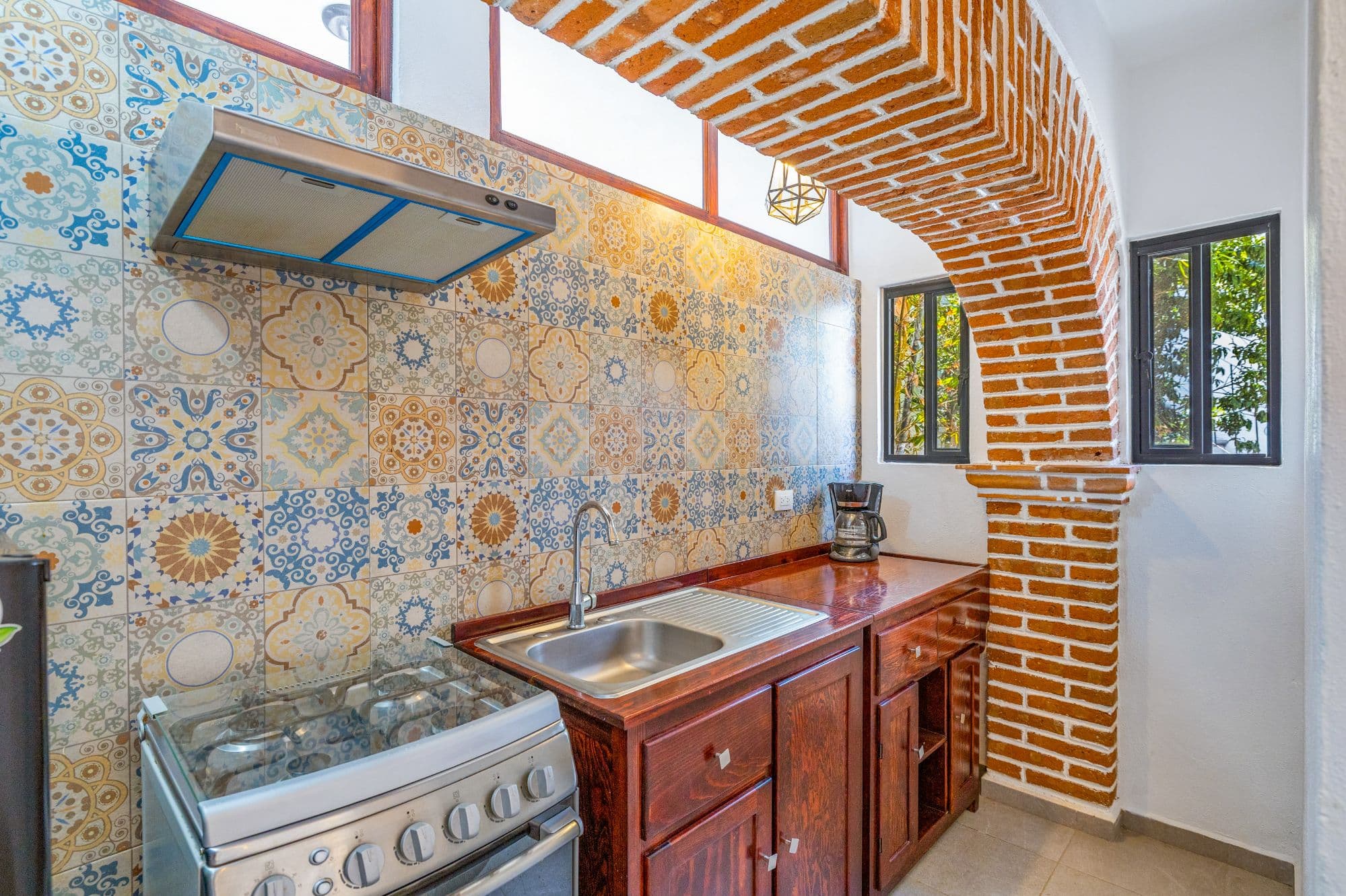Departamentos San Rafael — San Rafael, San Miguel de Allende — photo 6 — charming traditional kitchen with artisan tiles