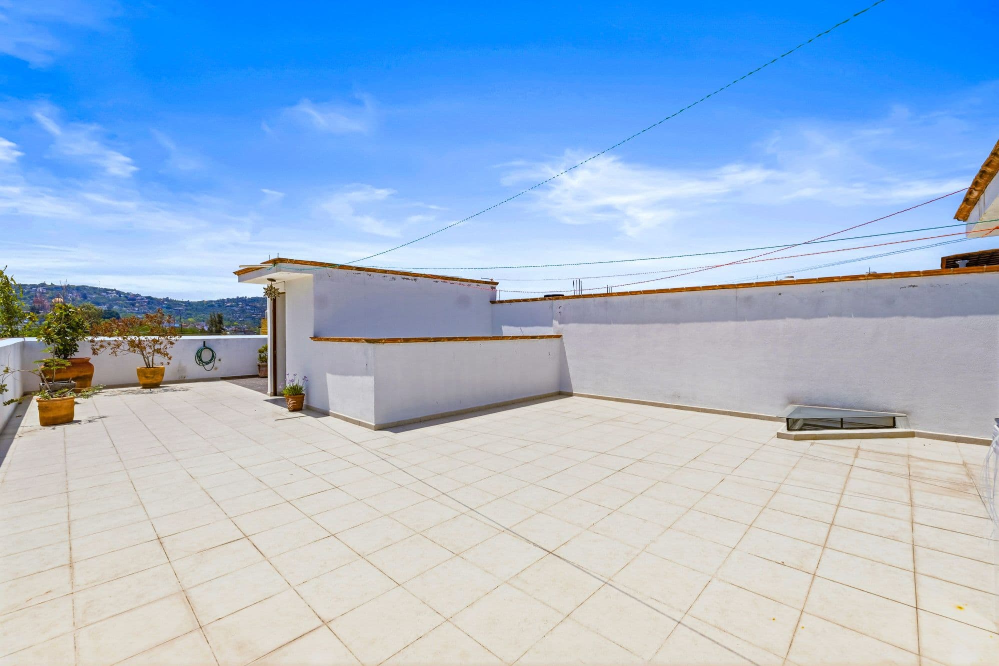 Departamentos San Rafael — San Rafael, San Miguel de Allende — photo 17 — expansive rooftop terrace, mountain views