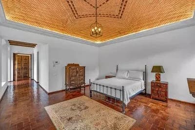 Casa Bamboo — Ojo de Agua, San Miguel de Allende — photo 13 — elegant master suite, soaring wooden ceilings