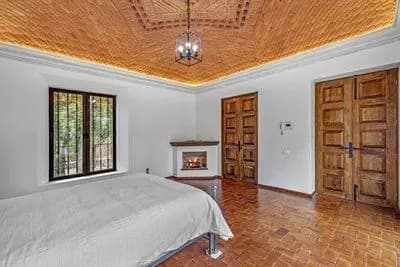 Casa Bamboo — Ojo de Agua, San Miguel de Allende — photo 16 — serene bedroom, soaring wooden ceiling