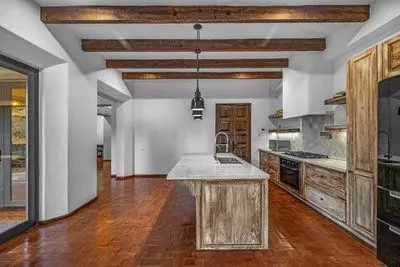 Casa Bamboo — Ojo de Agua, San Miguel de Allende — photo 7 — rustic-chic kitchen with soaring beams
