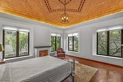 Casa Bamboo — Ojo de Agua, San Miguel de Allende — photo 12 — luminous master suite, soaring wooden ceiling