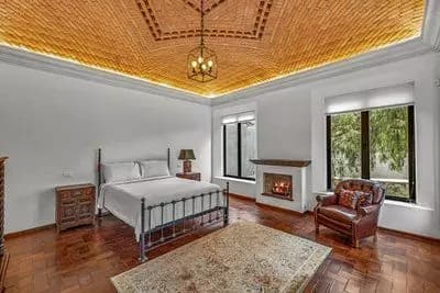 Casa Bamboo — Ojo de Agua, San Miguel de Allende — photo 11 — sunlit master suite, artisanal ceiling details