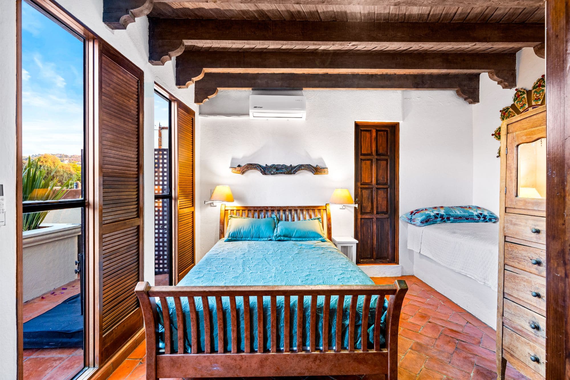 Casa Maria — San Miguel de Allende Centro, San Miguel de Allende — photo 24 — authentic colonial bedroom, rustic beams, panoramic views