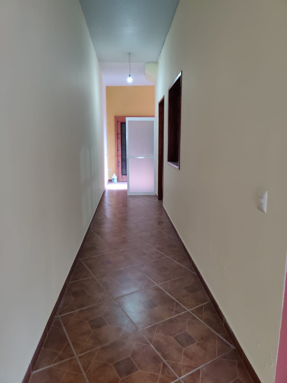Casa Esperanza — San Antonio, San Miguel de Allende — photo 7 — bright hallway, charming geometric floors