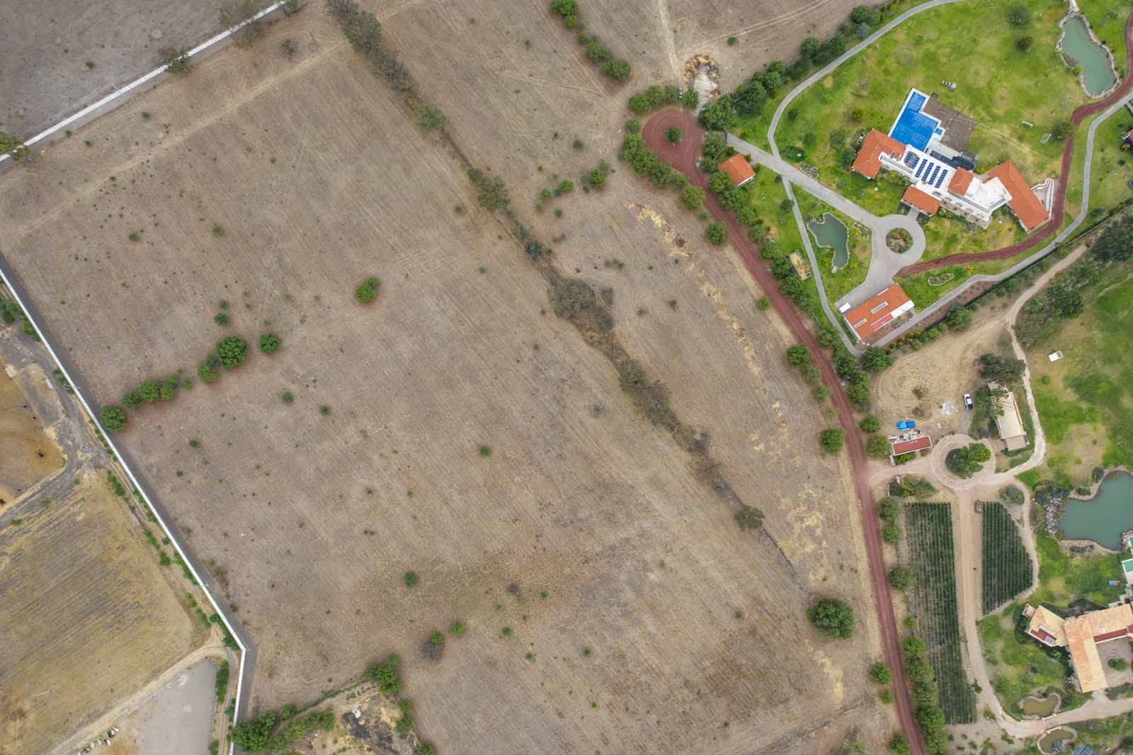 Las Fincas Lot 15 — Lindavista, San Miguel de Allende — photo 7 — expansive estate with manicured grounds