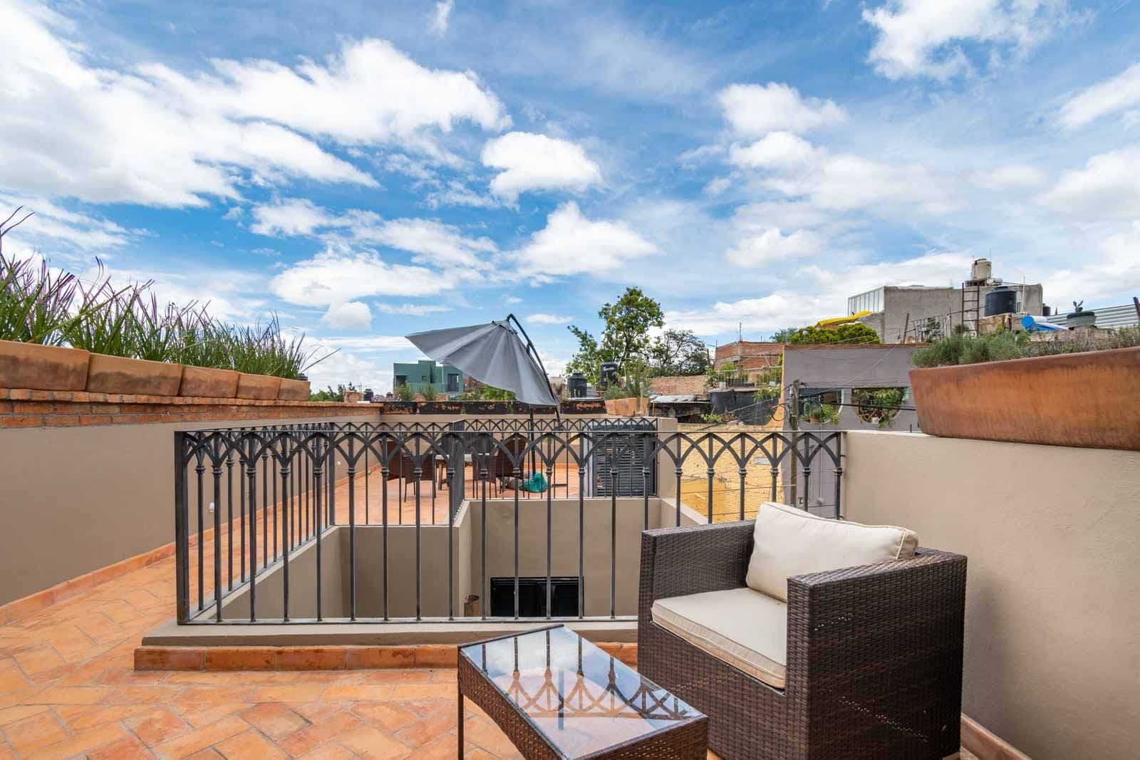 Casa de la Felicidad — San Antonio, San Miguel de Allende — photo 21 — expansive rooftop terrace with panoramic views
