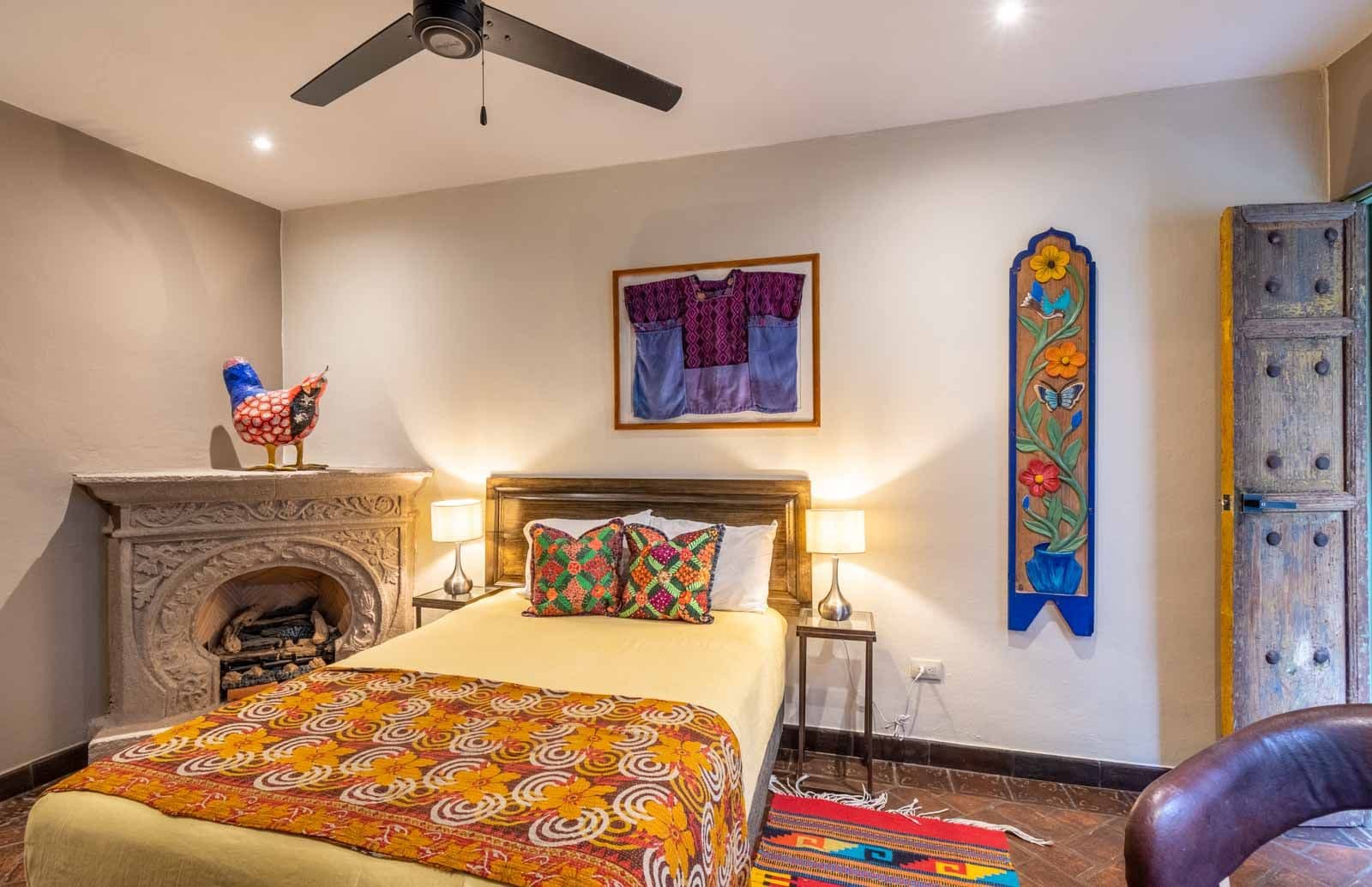 Casa de la Felicidad — San Antonio, San Miguel de Allende — photo 10 — artisan-inspired bedroom with colonial charm