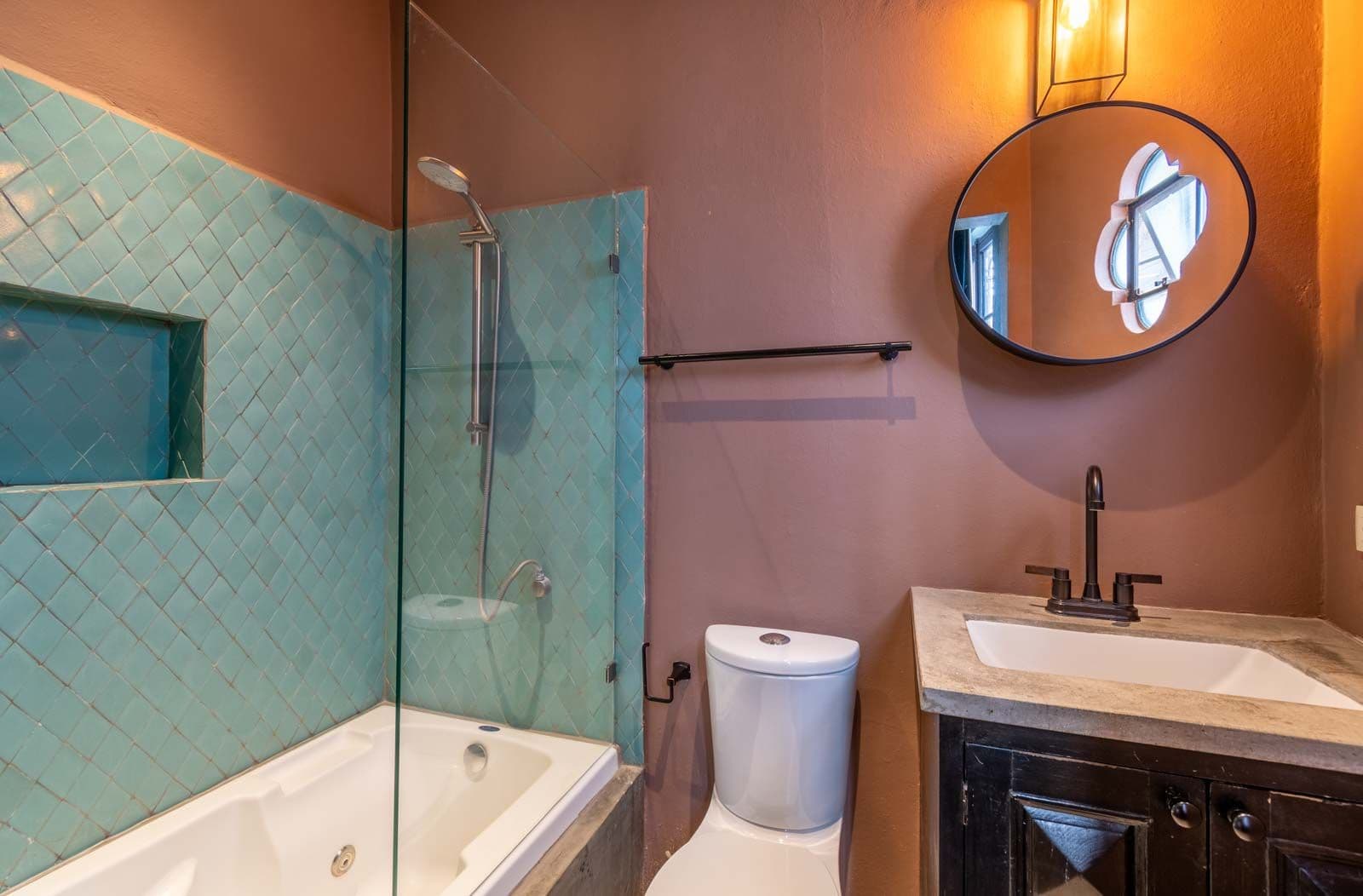 Casa de la Felicidad — San Antonio, San Miguel de Allende — photo 17 — spa-inspired bathroom with warm ambiance