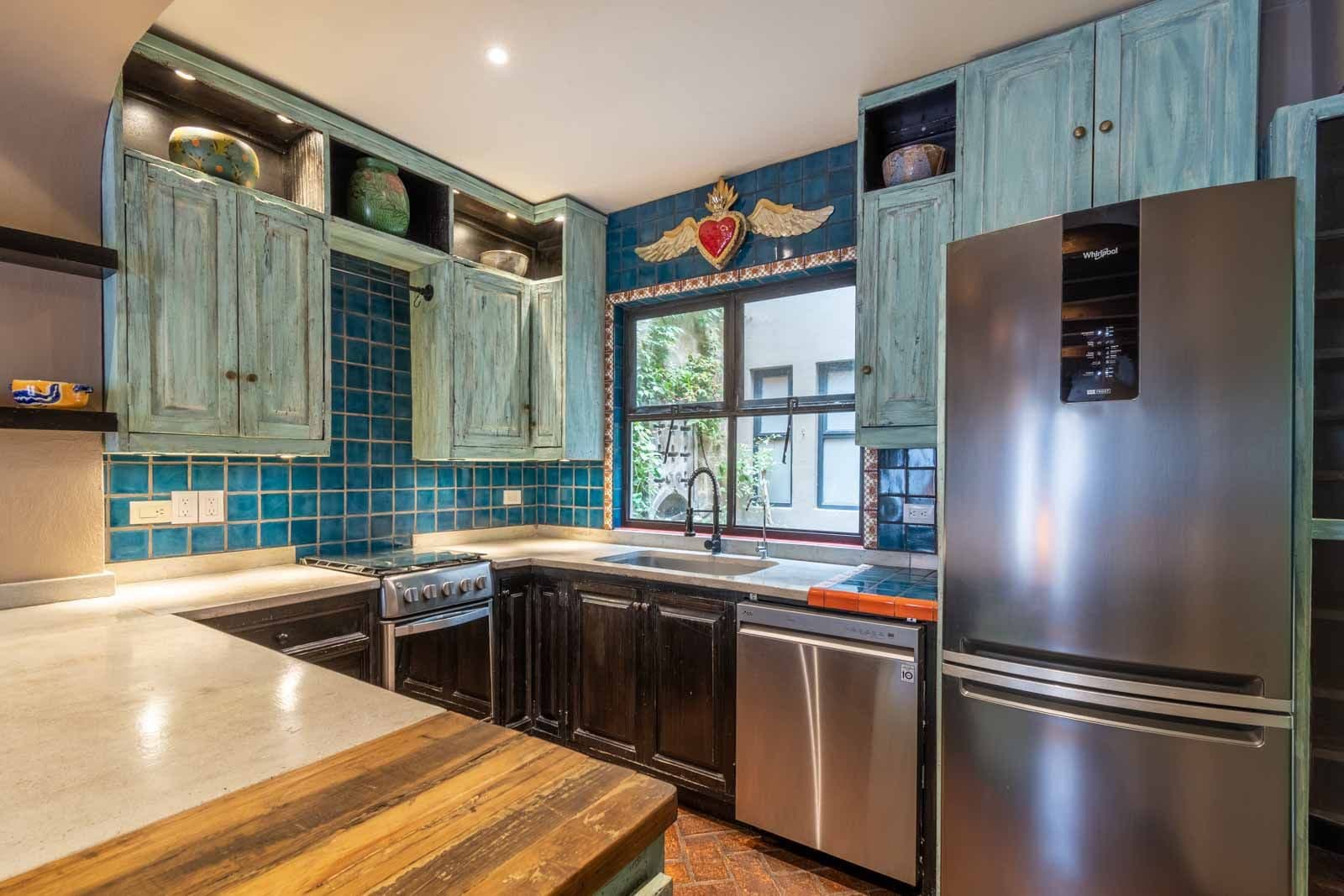 Casa de la Felicidad — San Antonio, San Miguel de Allende — photo 8 — artisan kitchen with turquoise charm