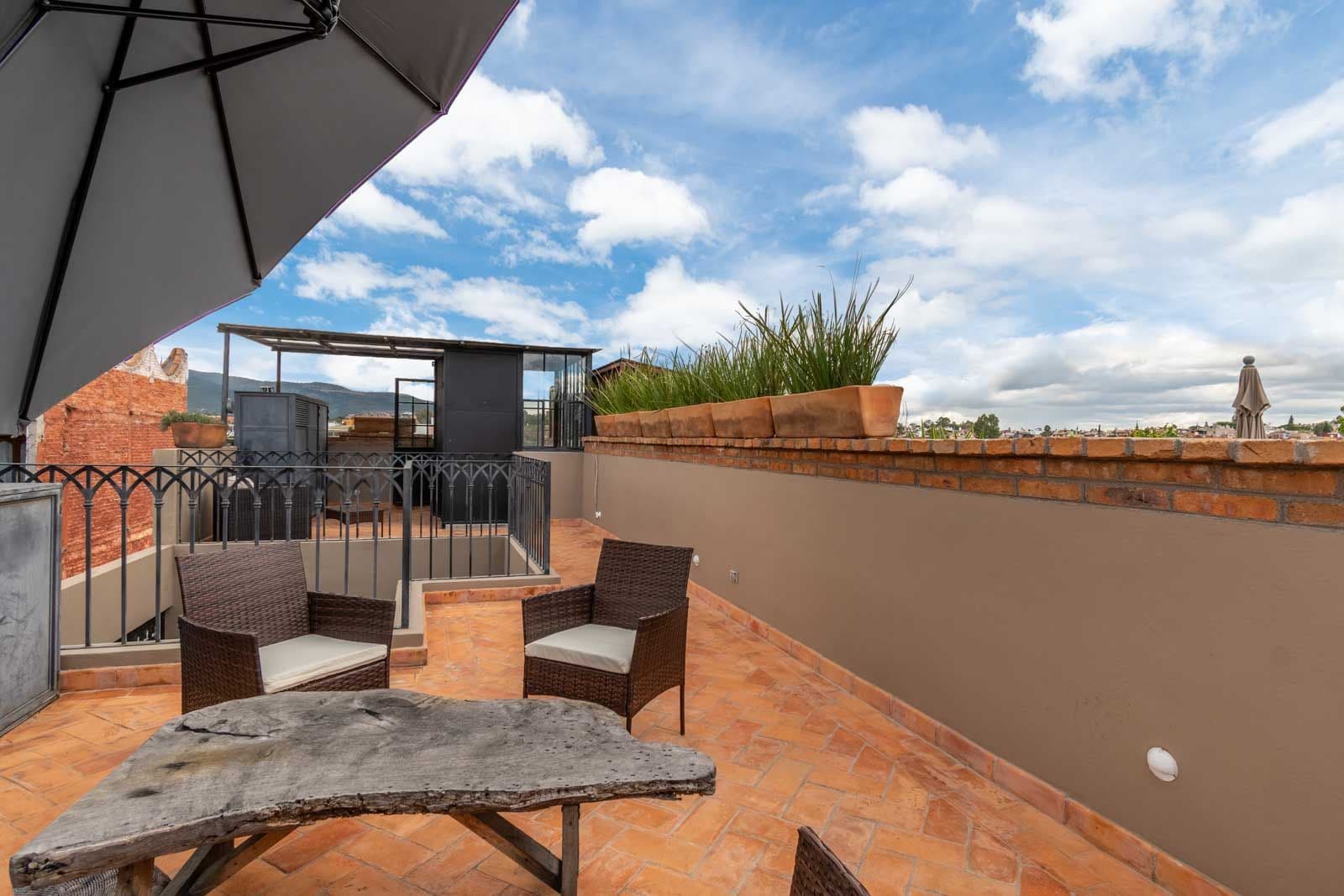 Casa de la Felicidad — San Antonio, San Miguel de Allende — photo 24 — stunning rooftop terrace with mountain views