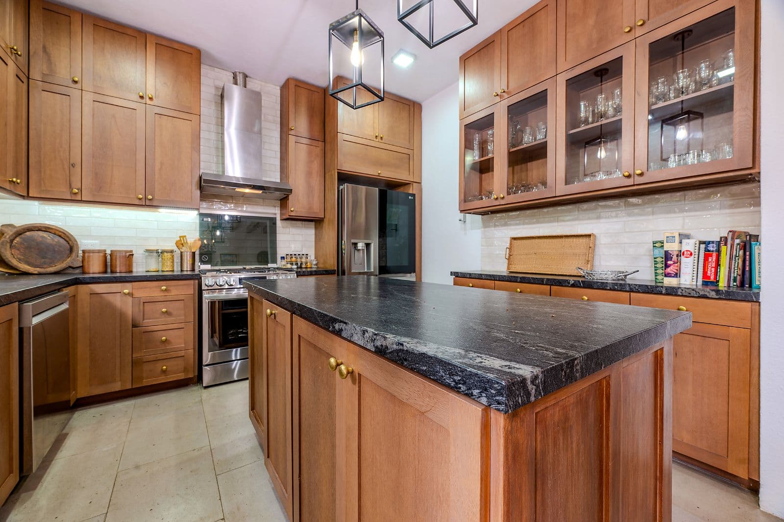 Casa Fia — Centro, San Miguel de Allende — photo 9 — sophisticated wood cabinetry, chef's kitchen elegance