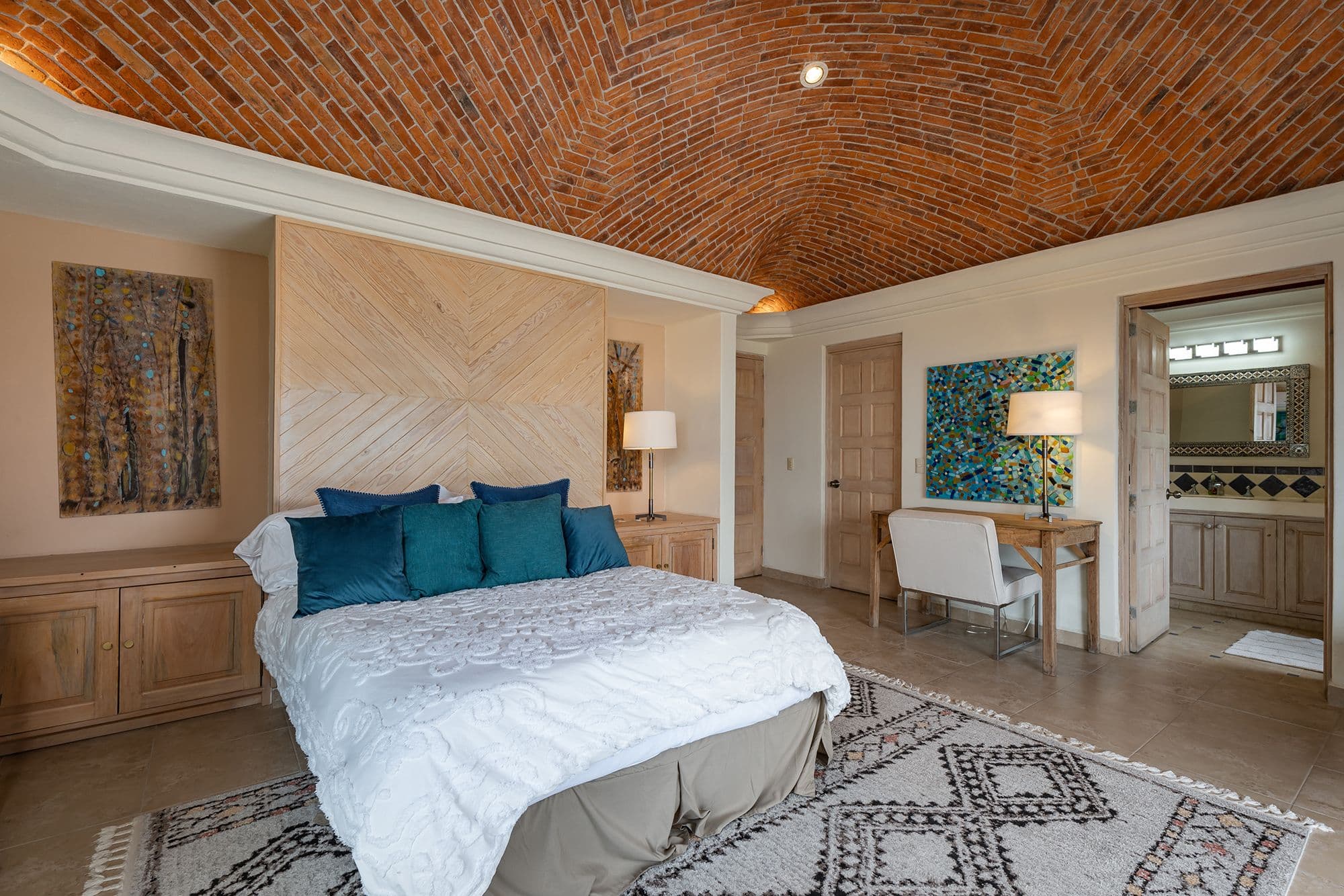 Casa Esplendida — Ojo de Agua, San Miguel de Allende — photo 15 — sophisticated master suite with vaulted brick ceilings