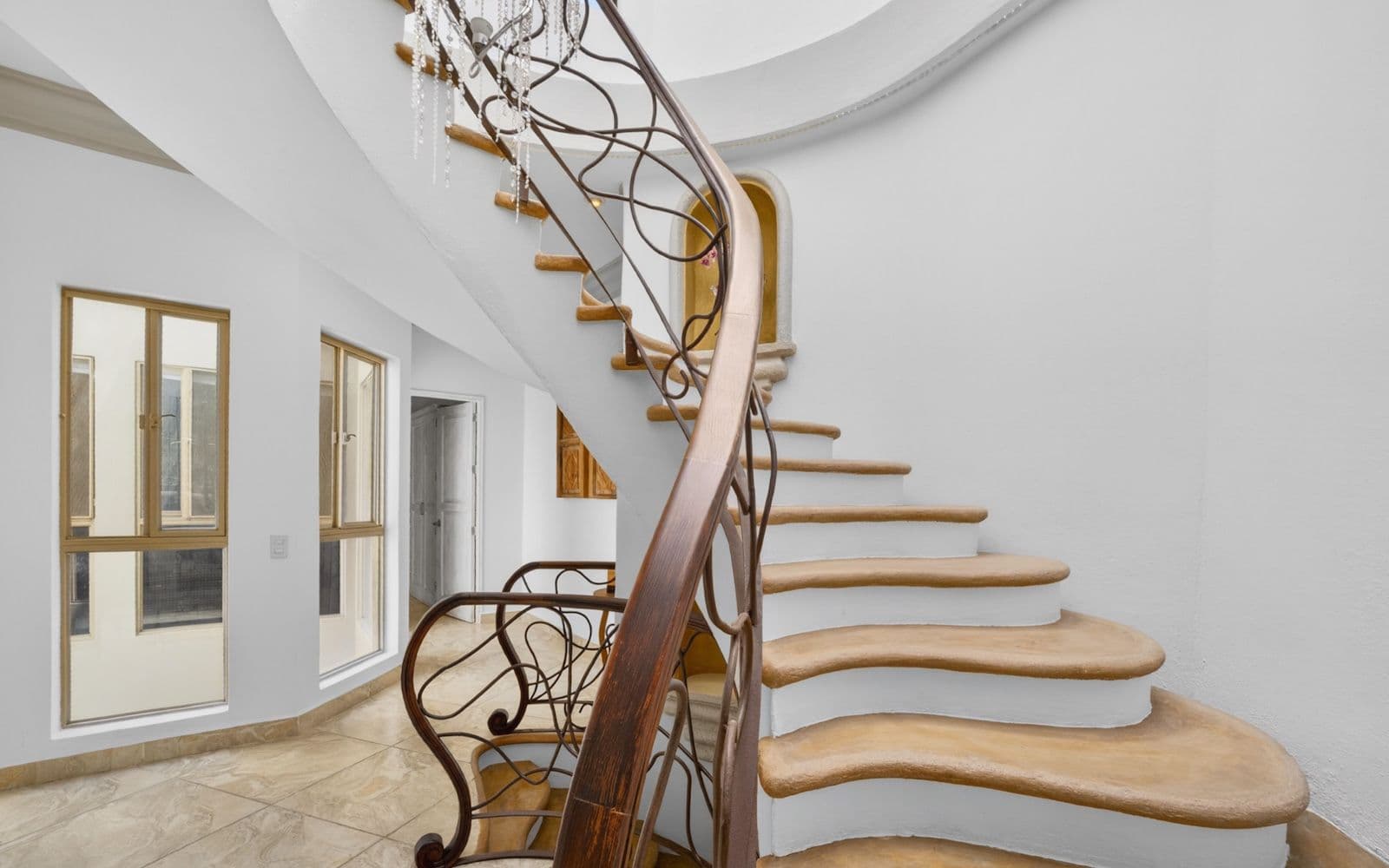 CASA PIEDRAS CHINAS — Centro, San Miguel de Allende — photo 20 — sculptural staircase, soaring architectural elegance