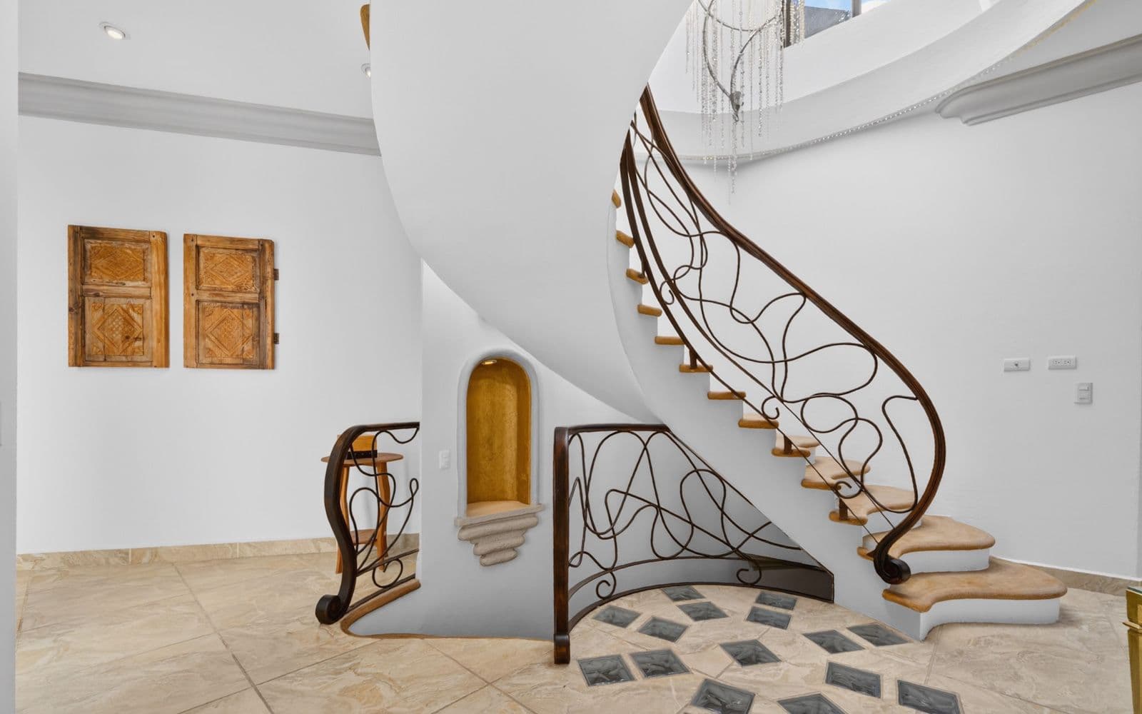 CASA PIEDRAS CHINAS — Centro, San Miguel de Allende — photo 11 — sculptural spiral staircase, timeless elegance